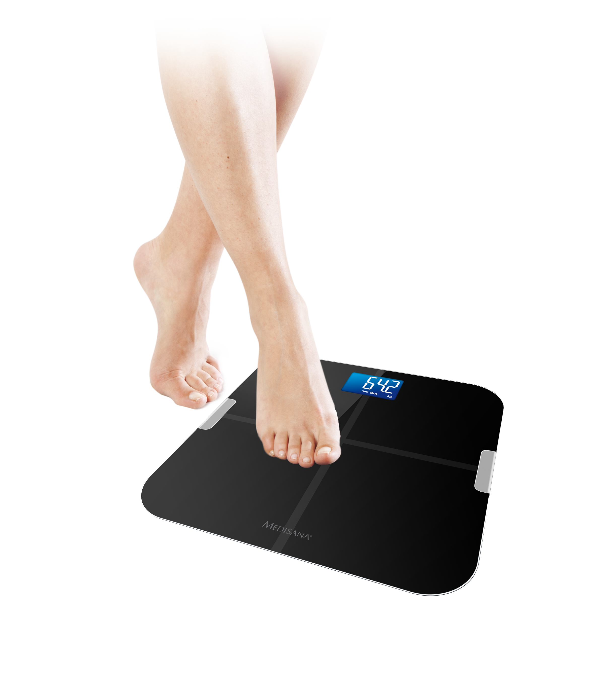 Czarna waga cyfrowa ze stopami osoby, wyświetlająca wagę 64,2.