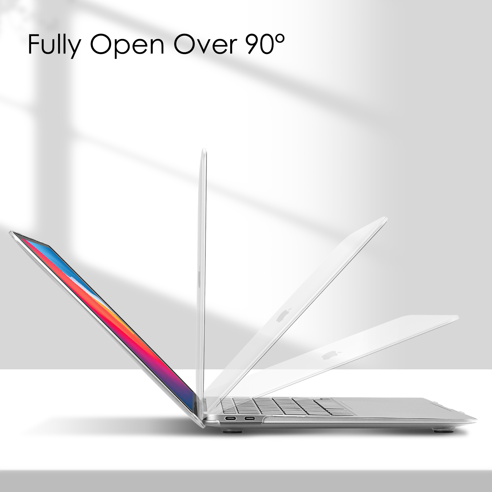 Ein Laptop ist über 90 Grad geöffnet, der Bildschirm zeigt Farben, auf einer weißen Oberfläche.