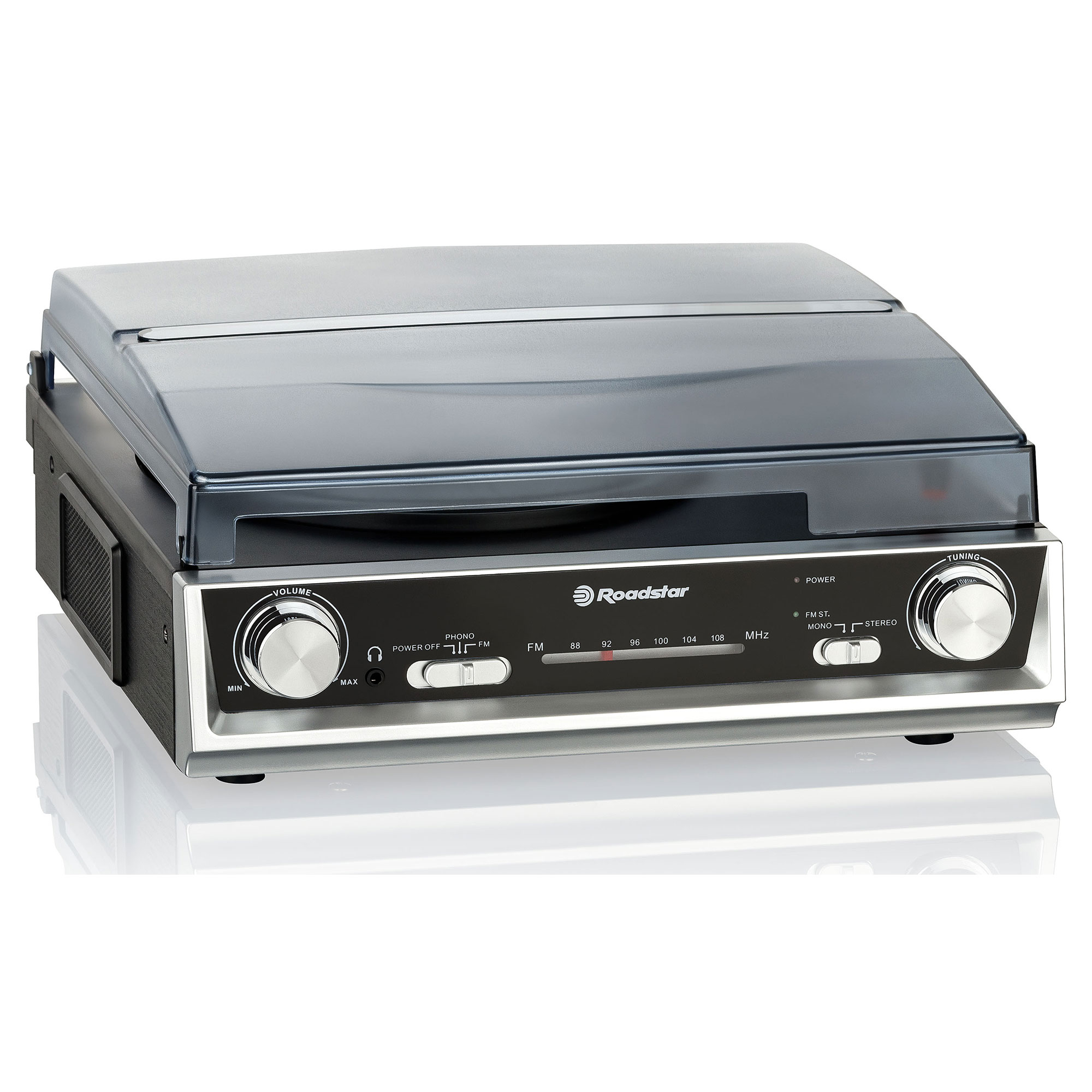 Un reproductor de radio-cassette vintage. Tiene una cubierta transparente y controles.
