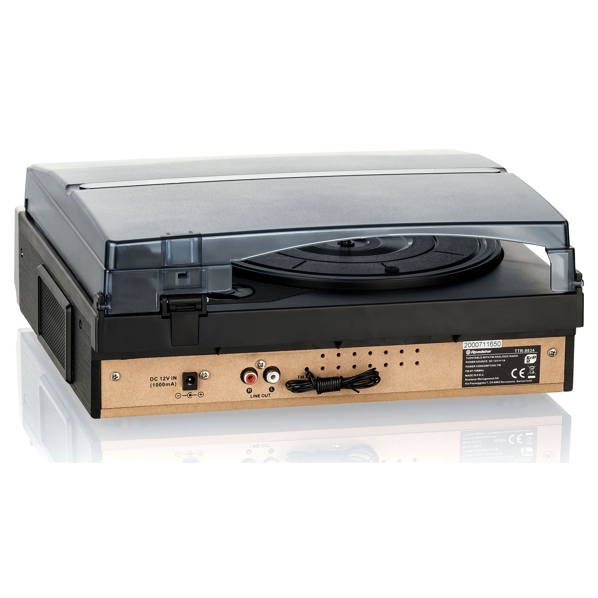 Tocadiscos vintage negro y marrón con tapa transparente, mostrando la parte trasera con conectores.