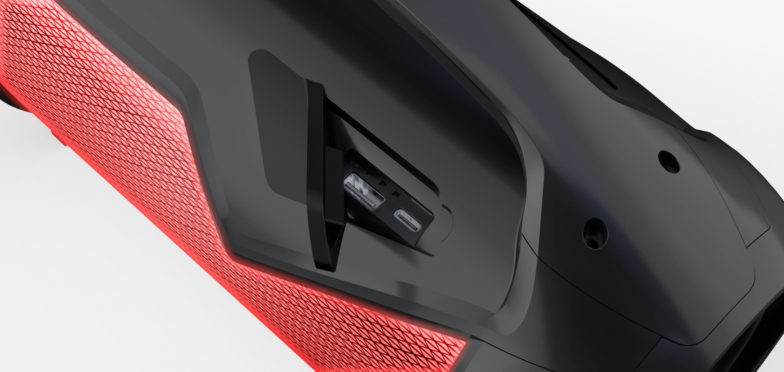 Czarne i czerwone urządzenie z portem USB.