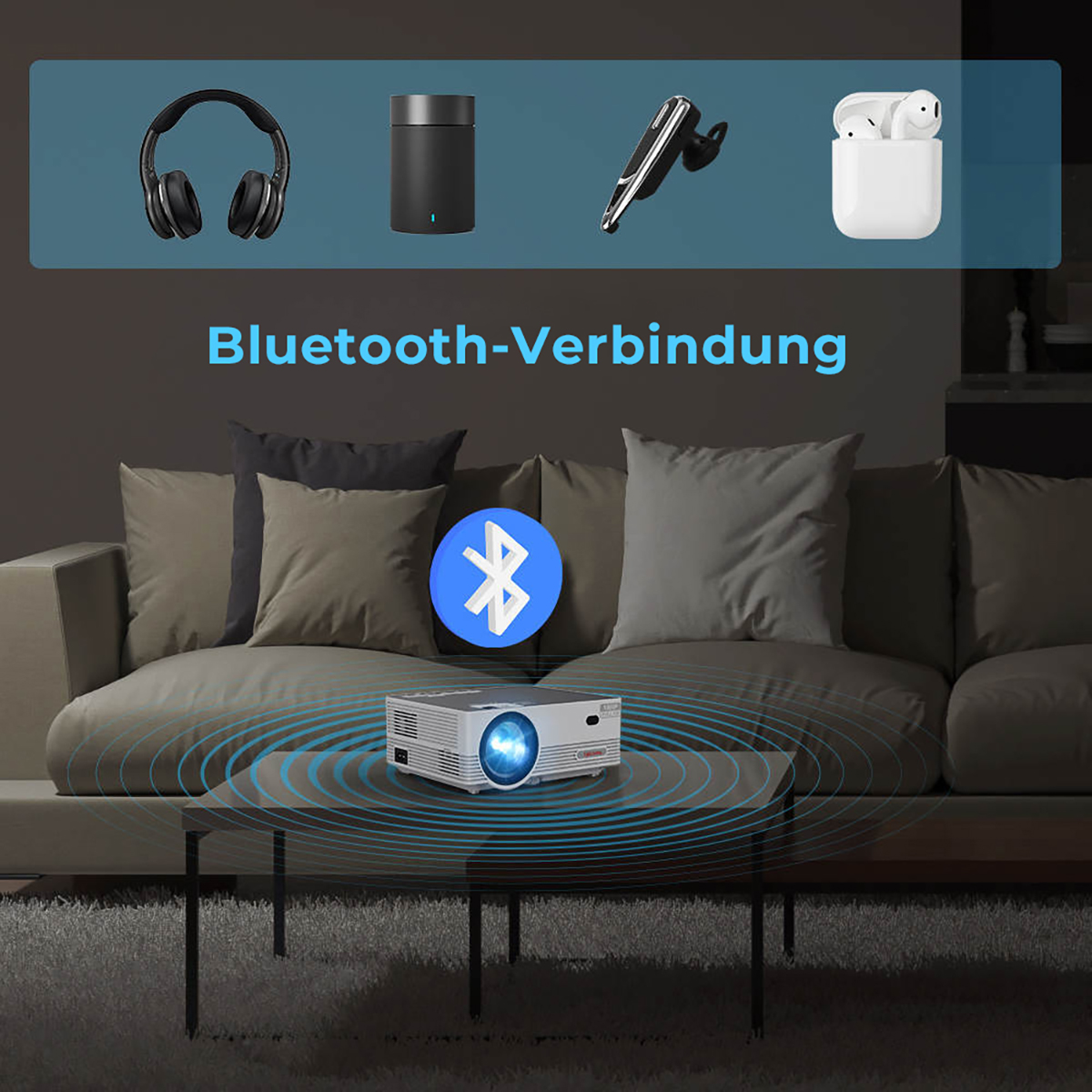 Ein Projektor auf einem Tisch mit Kopfhörern, Lautsprecher und Ohrhörern, Bluetooth.