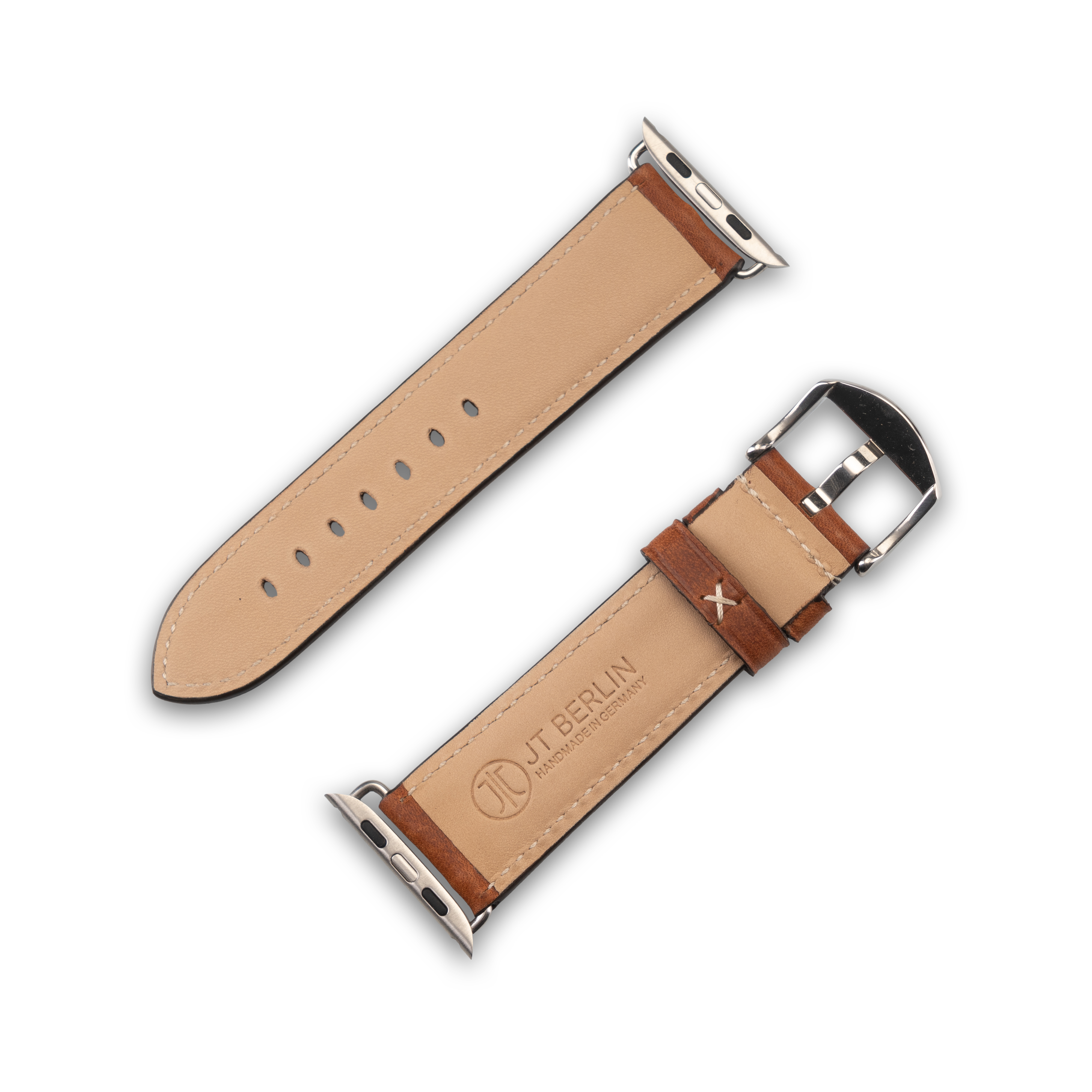 Zwei Leder-Armbänder, eines braun, eines beige, mit Metallverschlüssen und Stiften, auf weißem Untergrund.