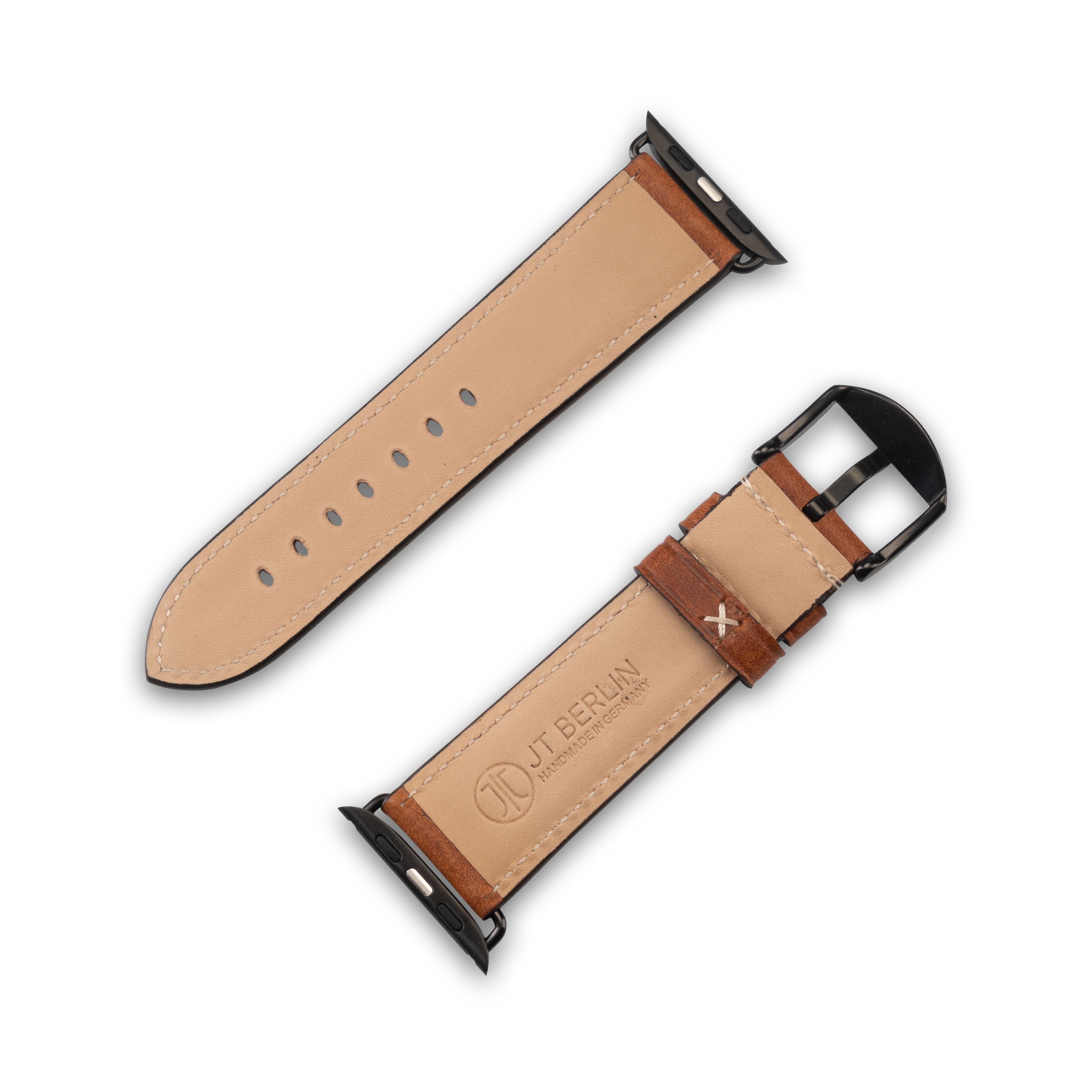 Zwei Leder-Armbänder. Eines liegt ausgebreitet, eines ist geschnallt.