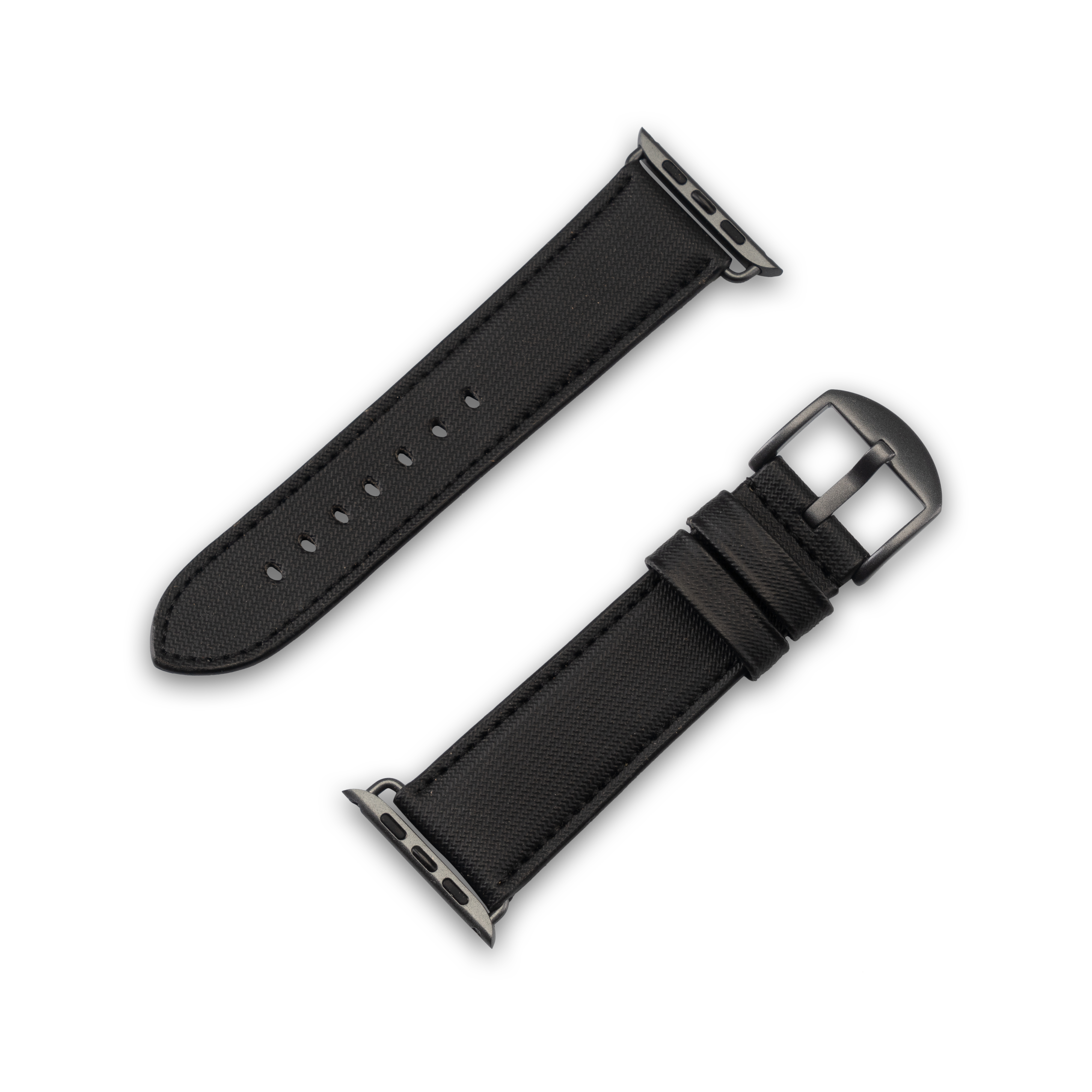 Zwei schwarze Uhrenarmbänder liegen auf einer weißen Oberfläche. Eines ist geschnallt, das andere separat.