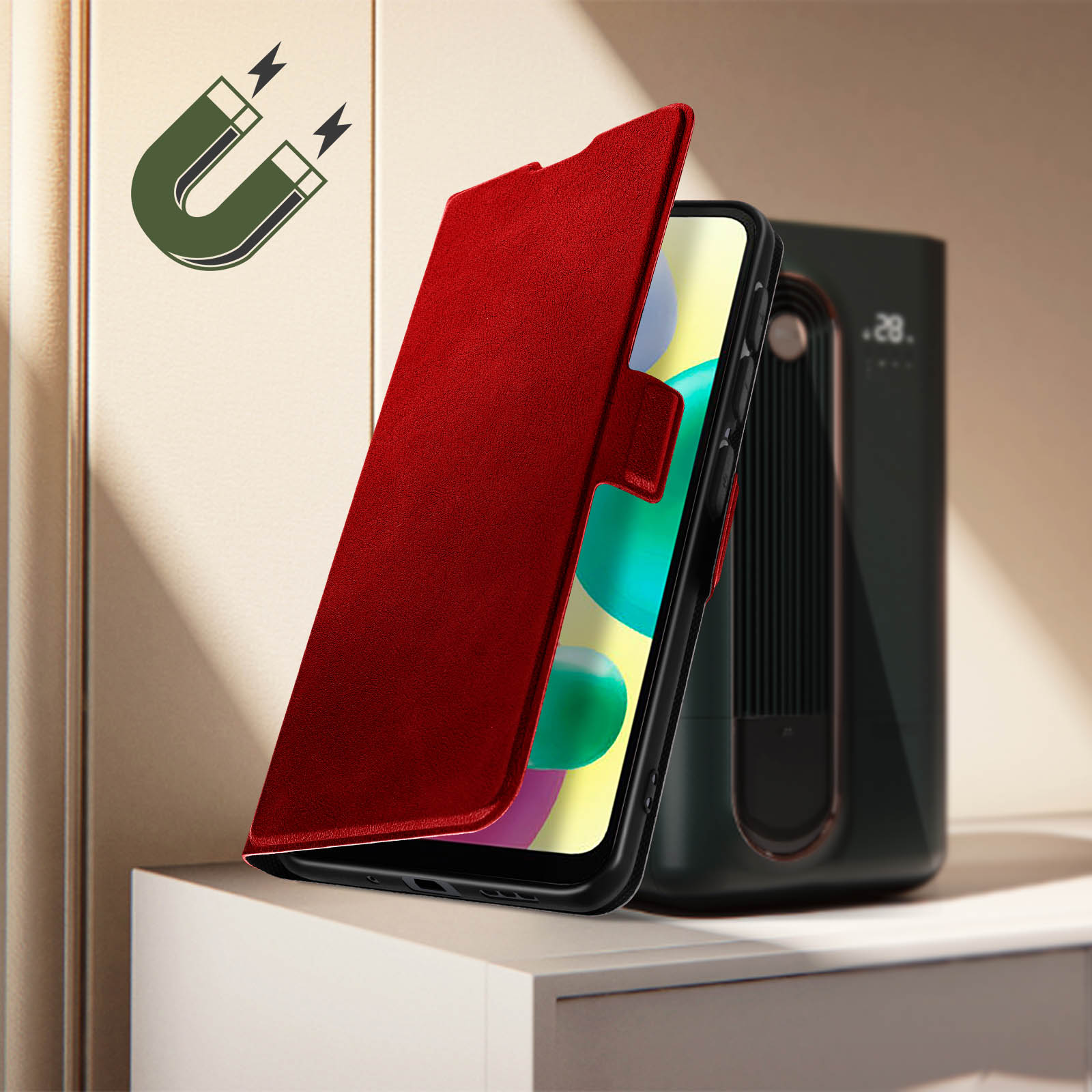 Eine rote Handyhülle ist geöffnet und zeigt ein Telefon. Hintergrund: Magnet und kleines Gerät.
