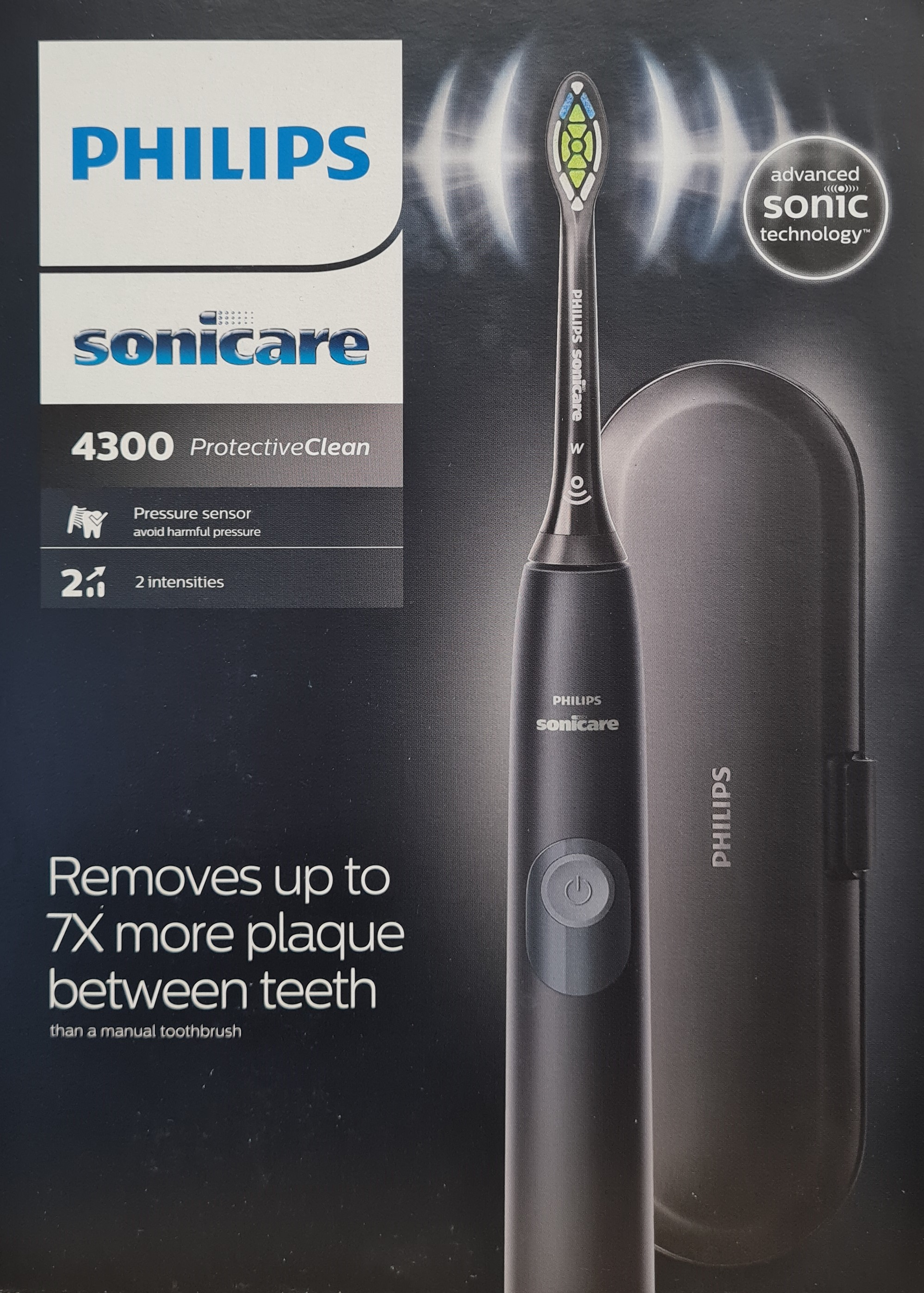 Spazzolino elettrico e custodia su sfondo nero. Testo sulla scatola: Sonicare.