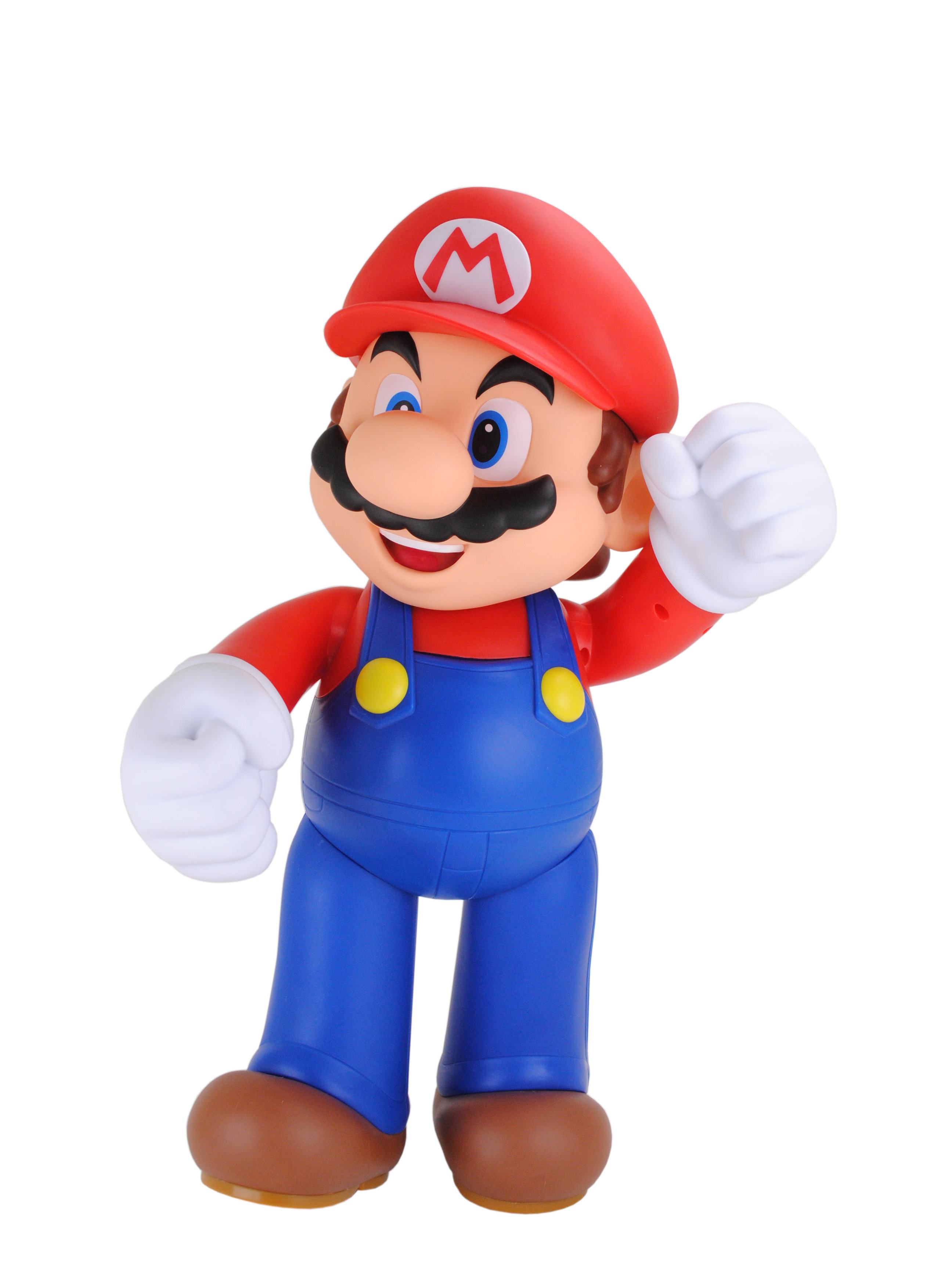 Figurka Mario w pozie w ruchu. Czerwona czapka, niebieskie ogrodniczki, białe rękawiczki.