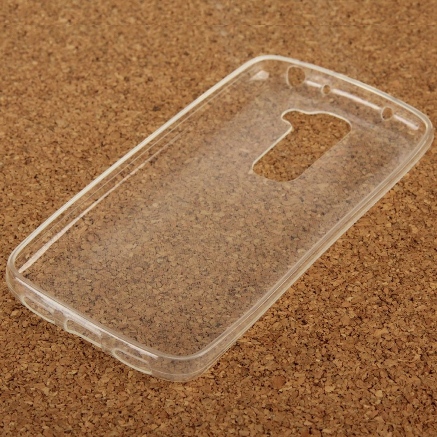 Eine transparente Handyhülle auf einer strukturierten Oberfläche. Die Hülle ist abgewinkelt.