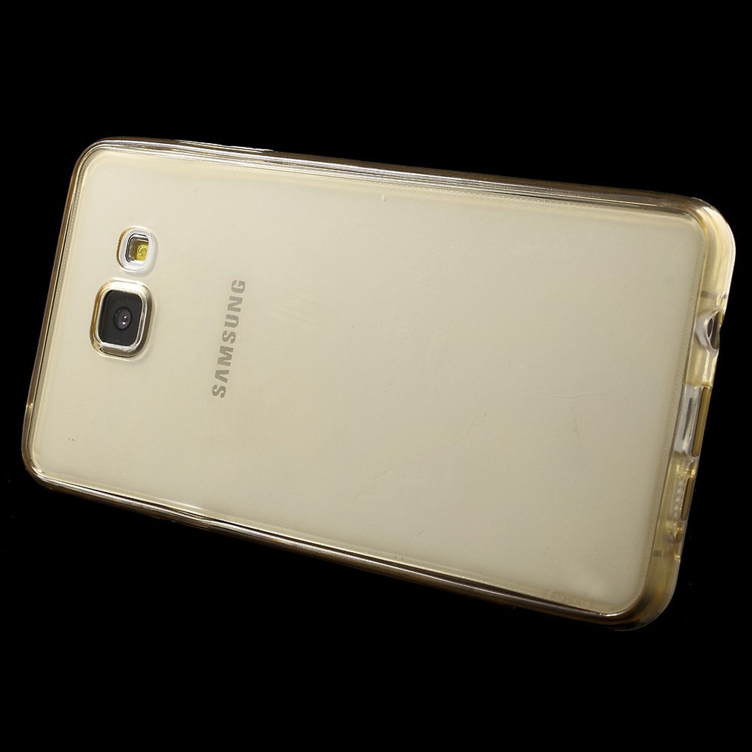Goldenes Telefon, in Hülle. Schwarzer Hintergrund.