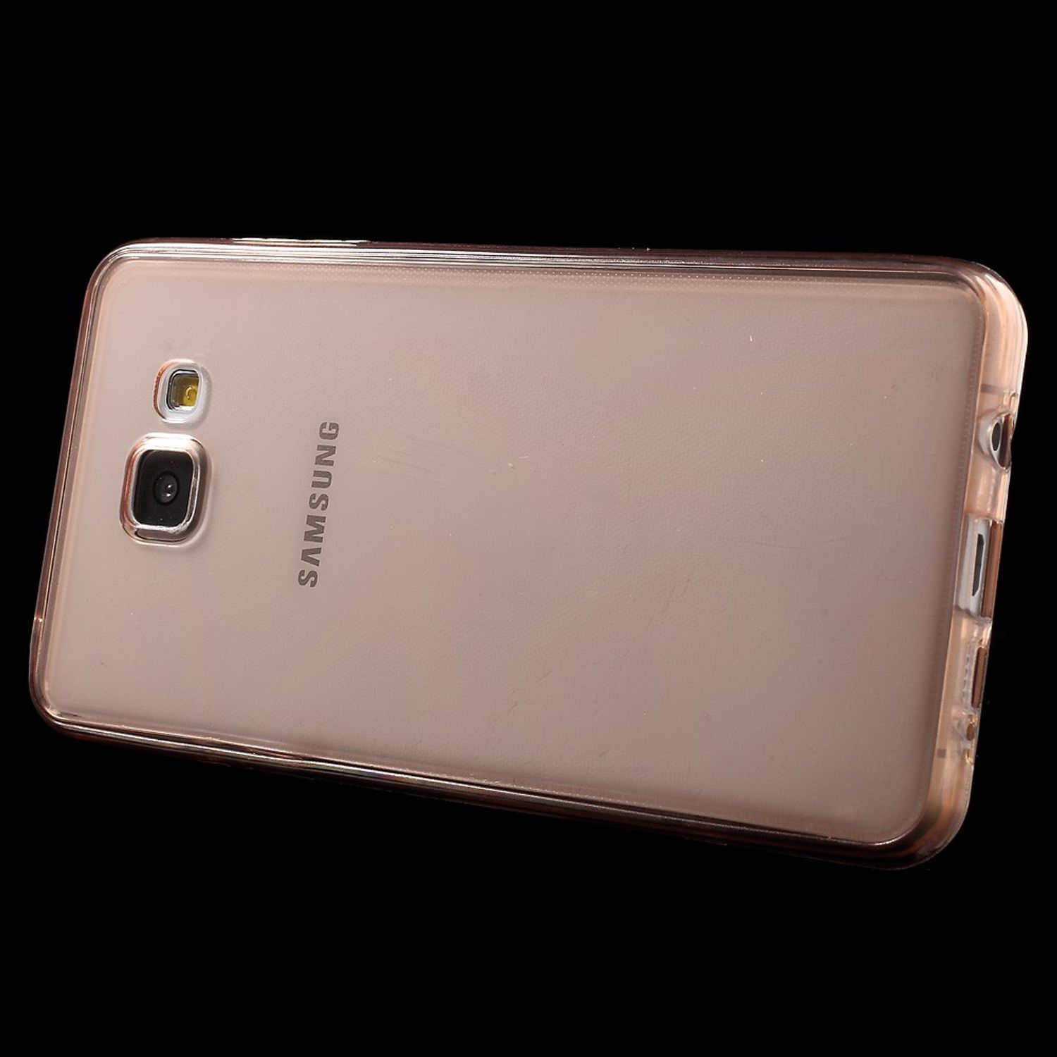 Eine transparente Handyhülle auf schwarzem Hintergrund. Das Telefon ist sichtbar, mit Kamera und Samsung Logo.