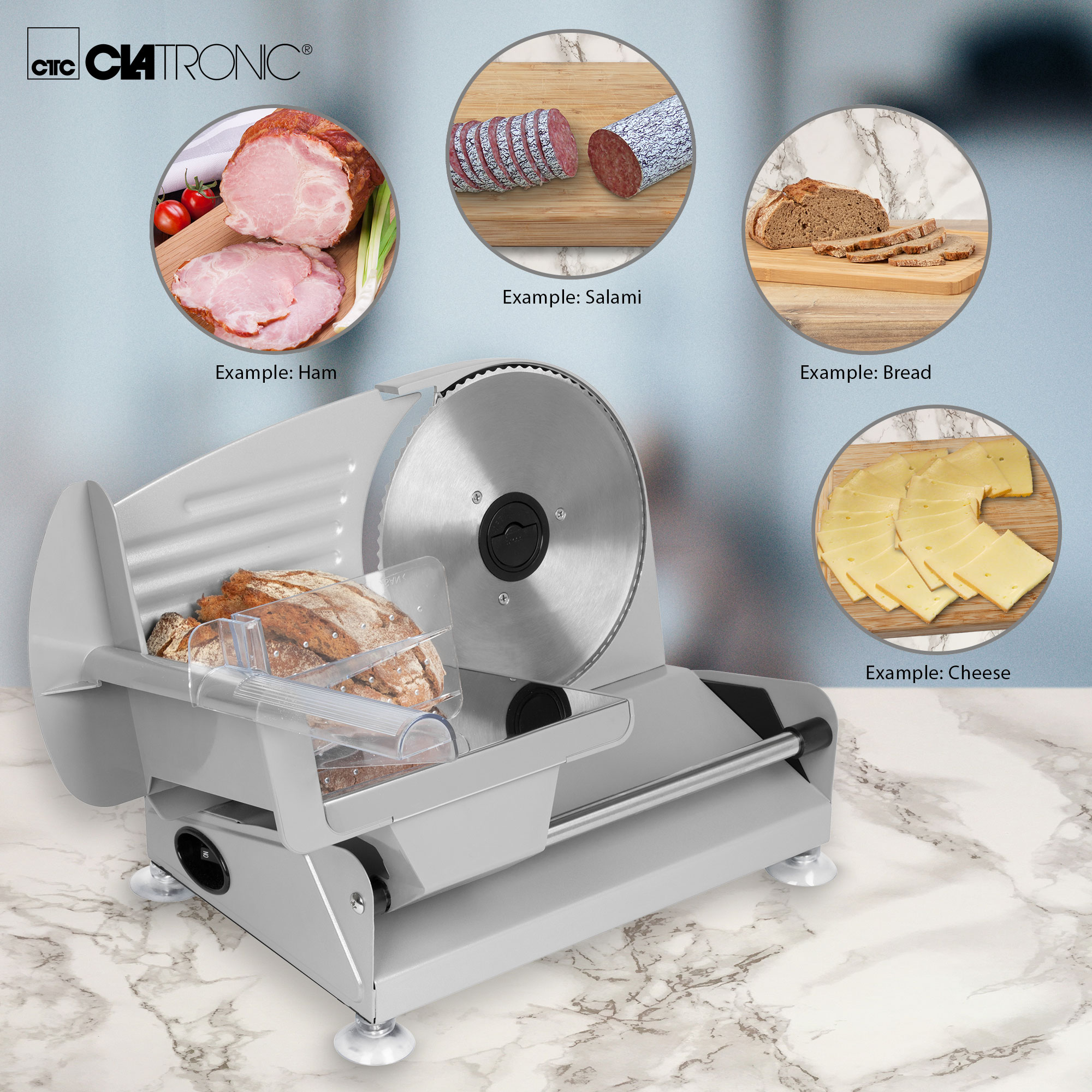 Szara krajalnica do mięsa z przykładami szynki, salami, chleba i sera.