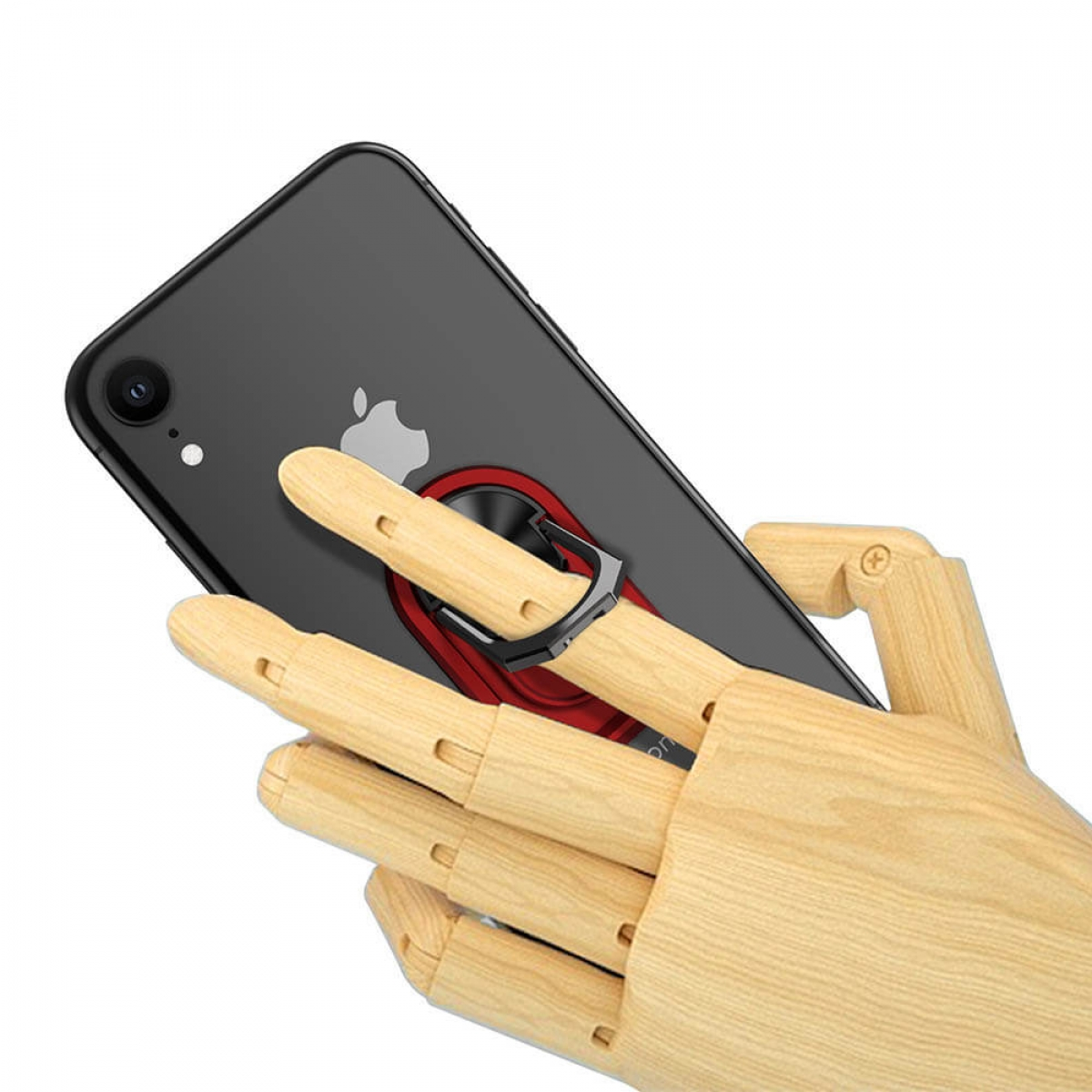 Hand hält ein Telefon mit rotem Ringhalter. Das Telefon ist schwarz und hat ein weißes Apple-Logo.