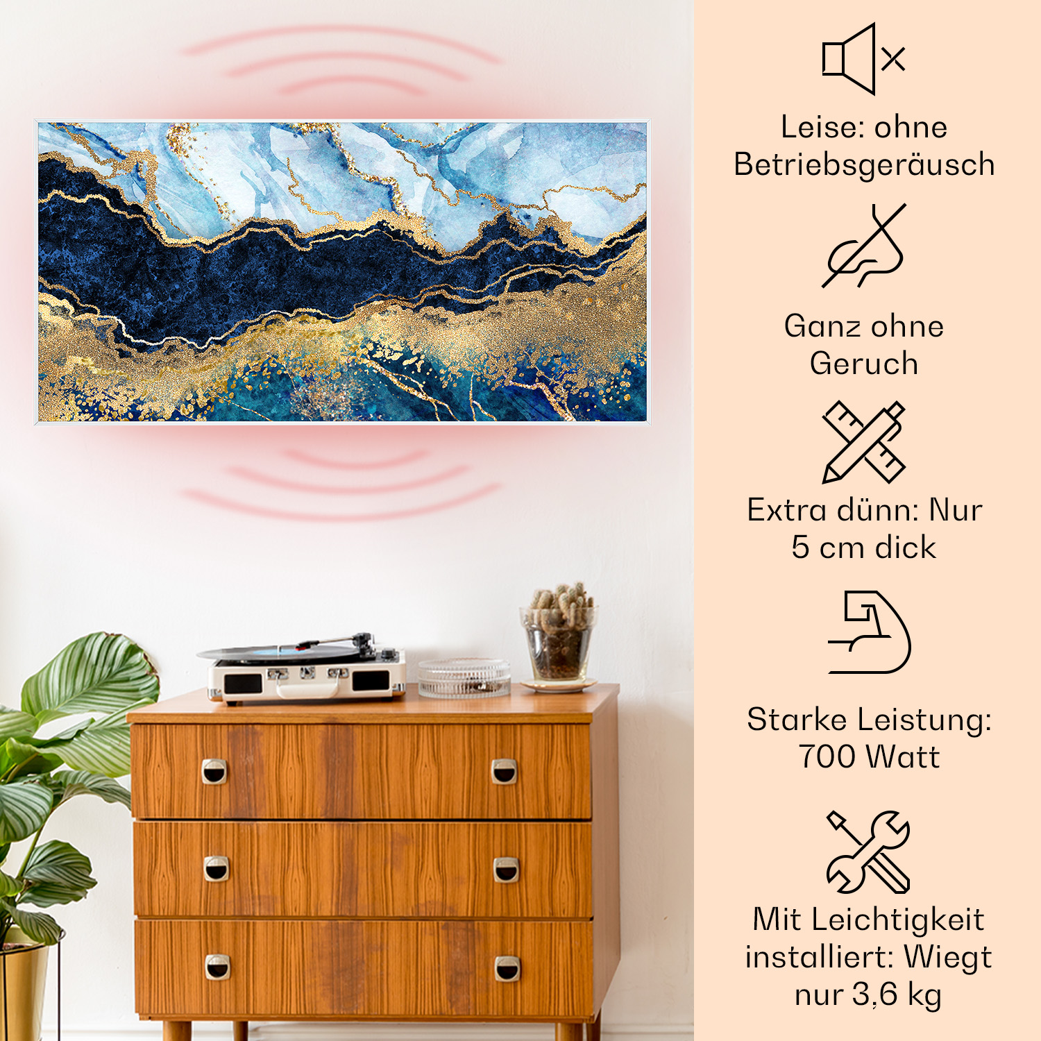 Abstrakte Kunst in Blau und Gold an einer Wand. Ein Retro-Schrank und ein Plattenspieler im Vordergrund.