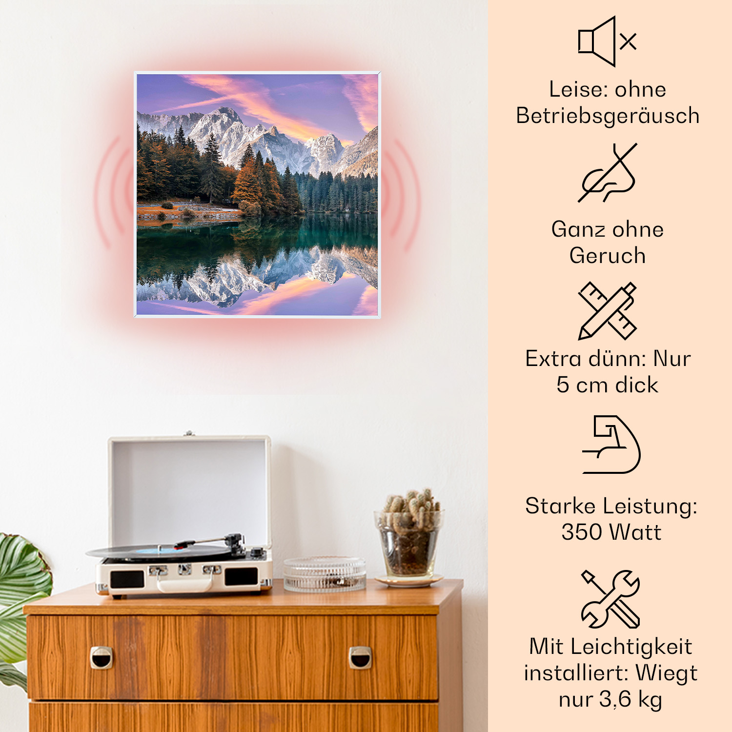 Moderne Wandkunst mit einer schneebedeckten Berglandschaft. Auf einem Holzschrank steht ein Retro-Plattenspieler.