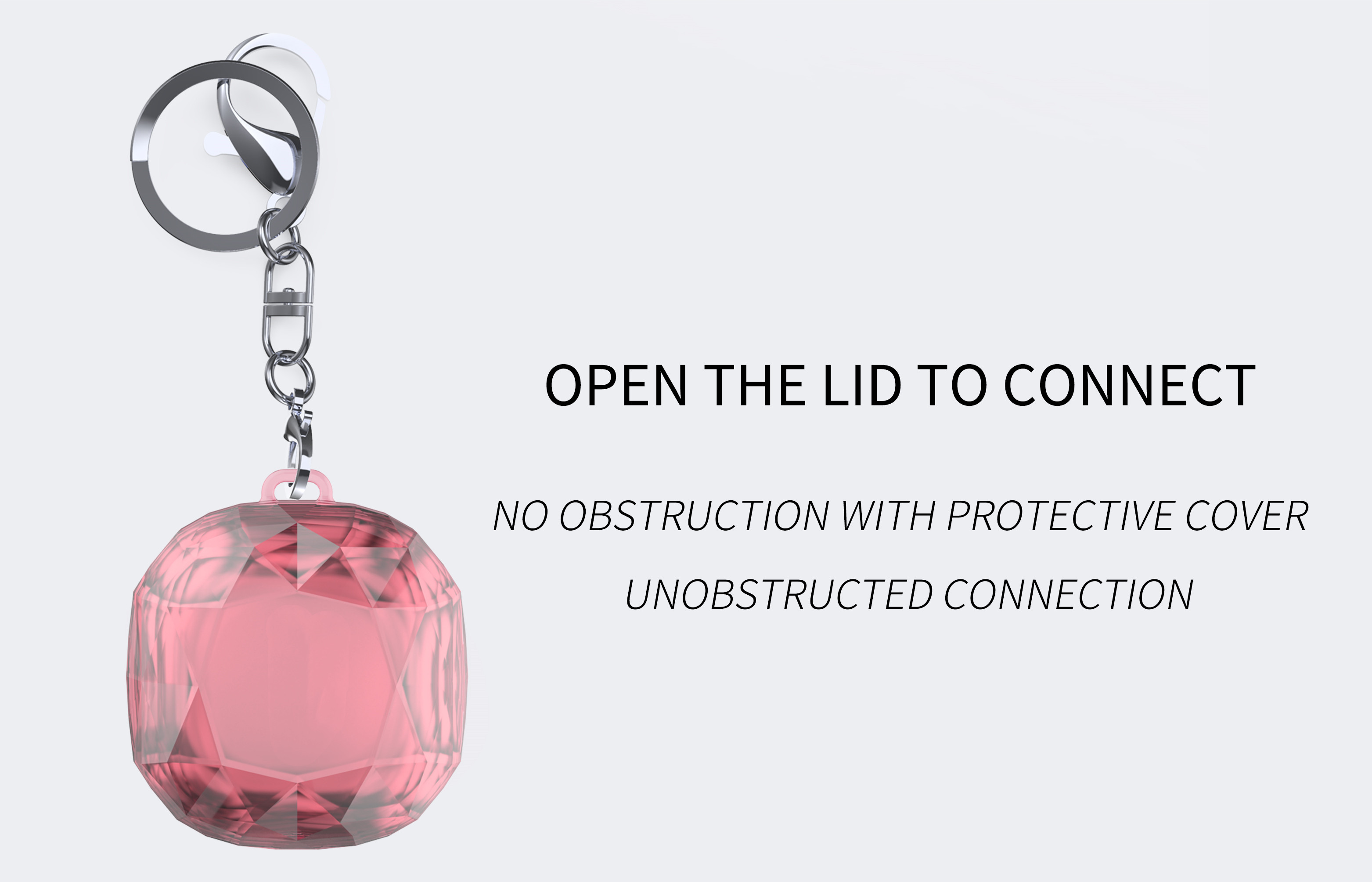 Llavero rosa en forma de joya. Texto: ABRE LA TAPA PARA CONECTAR, SIN OBSTRUCCIÓN, CONEXIÓN SIN OBSTÁCULOS.