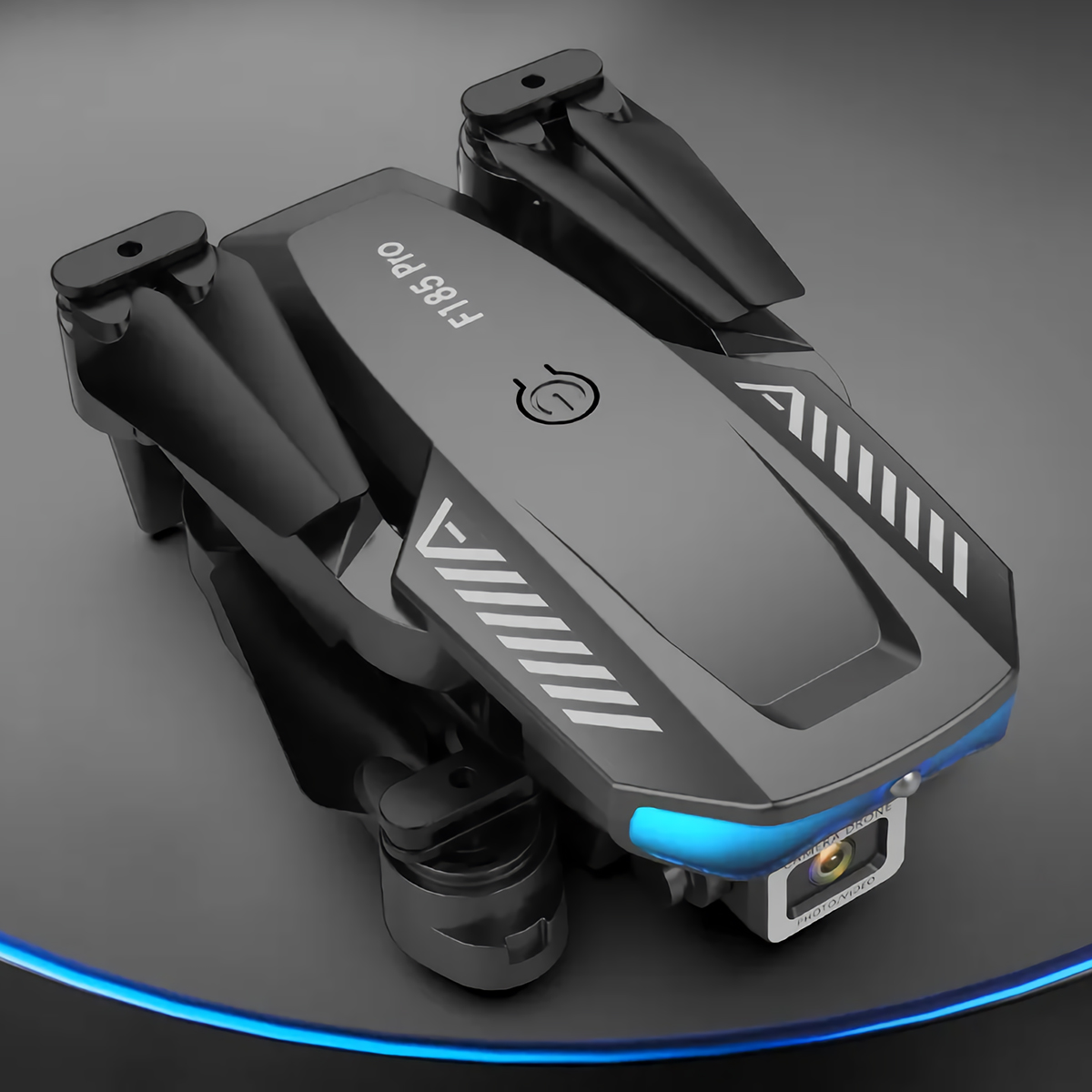 Drone negro con rayas blancas y el texto F185 PRO sobre una superficie oscura. Luces azules.