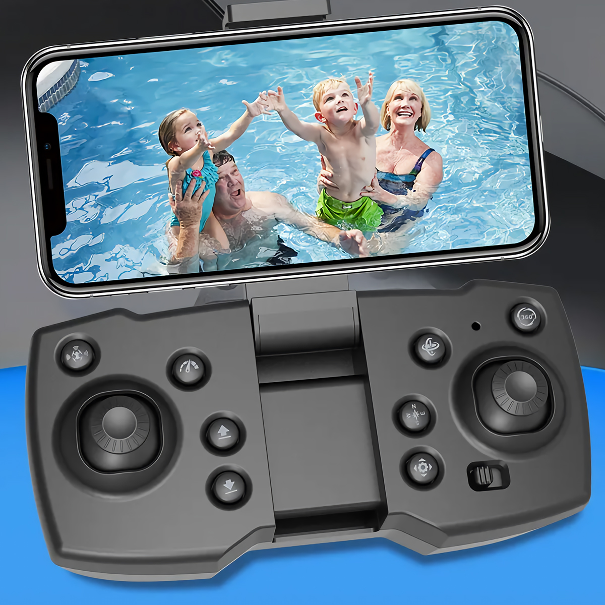 Un smartphone muestra a una familia en una piscina, sostenido sobre el mando a distancia de un dron. El control tiene botones.