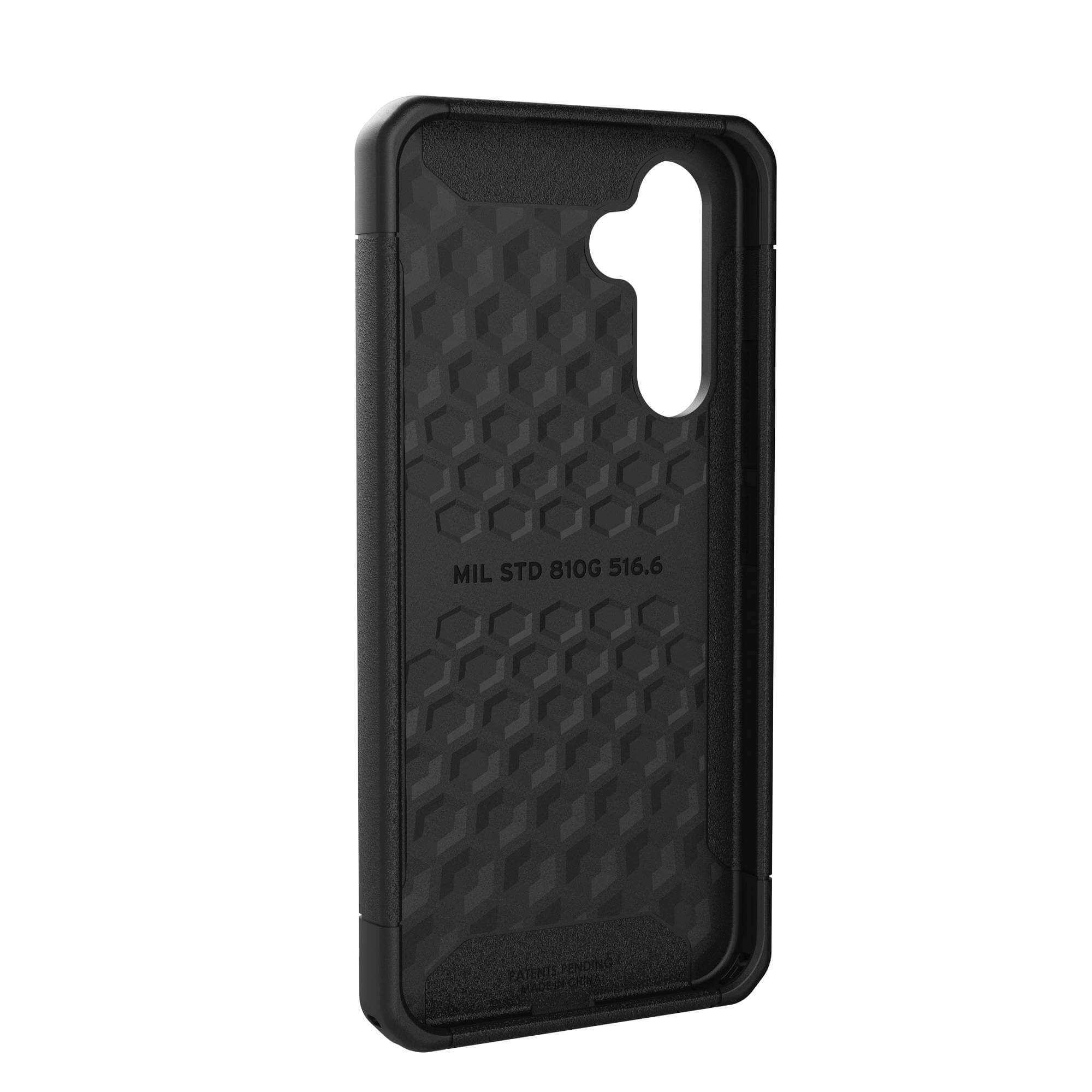 Black phone case interior with textured design. Patterned detail. Close up.