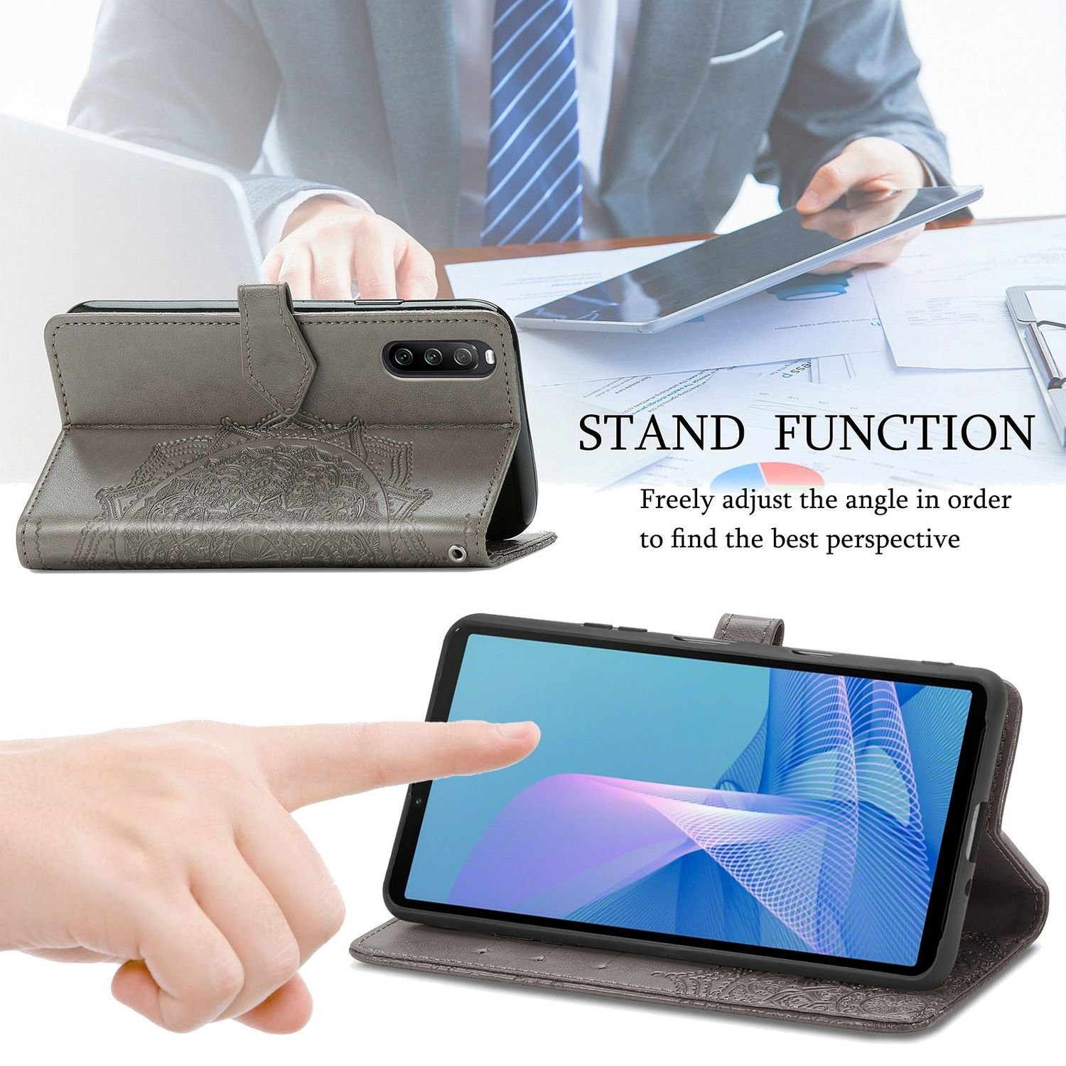 Eine graue Handyhülle mit Ständerfunktion, mit einem Telefon und einem Tablet.