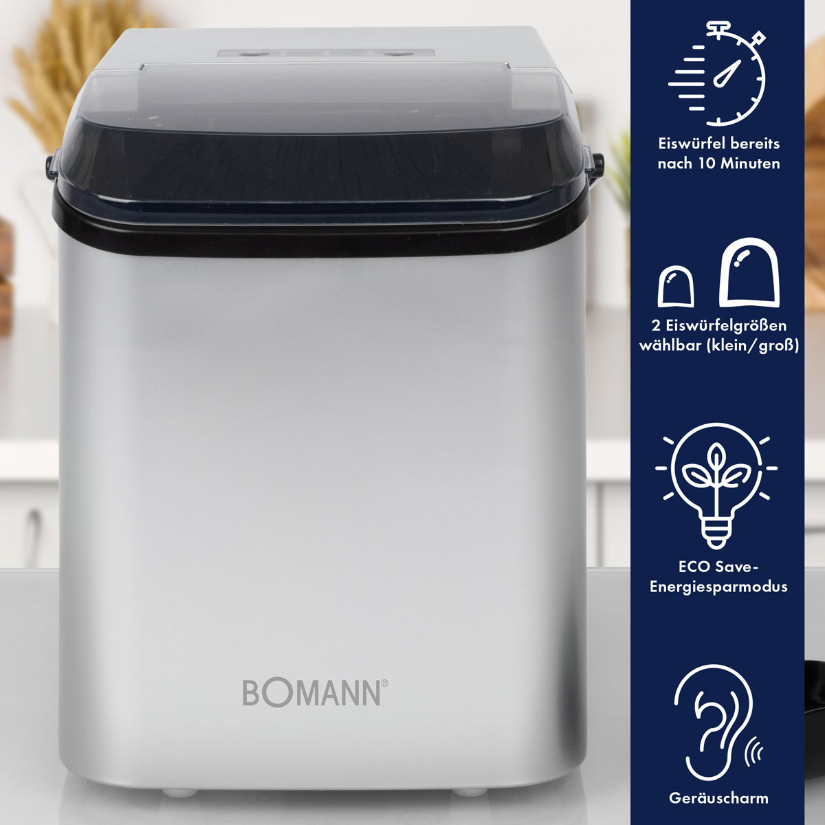 Srebrna maszyna do lodu z czarnym wieczkiem. Tekst po prawej stronie opisuje funkcje, takie jak szybkie wytwarzanie lodu.