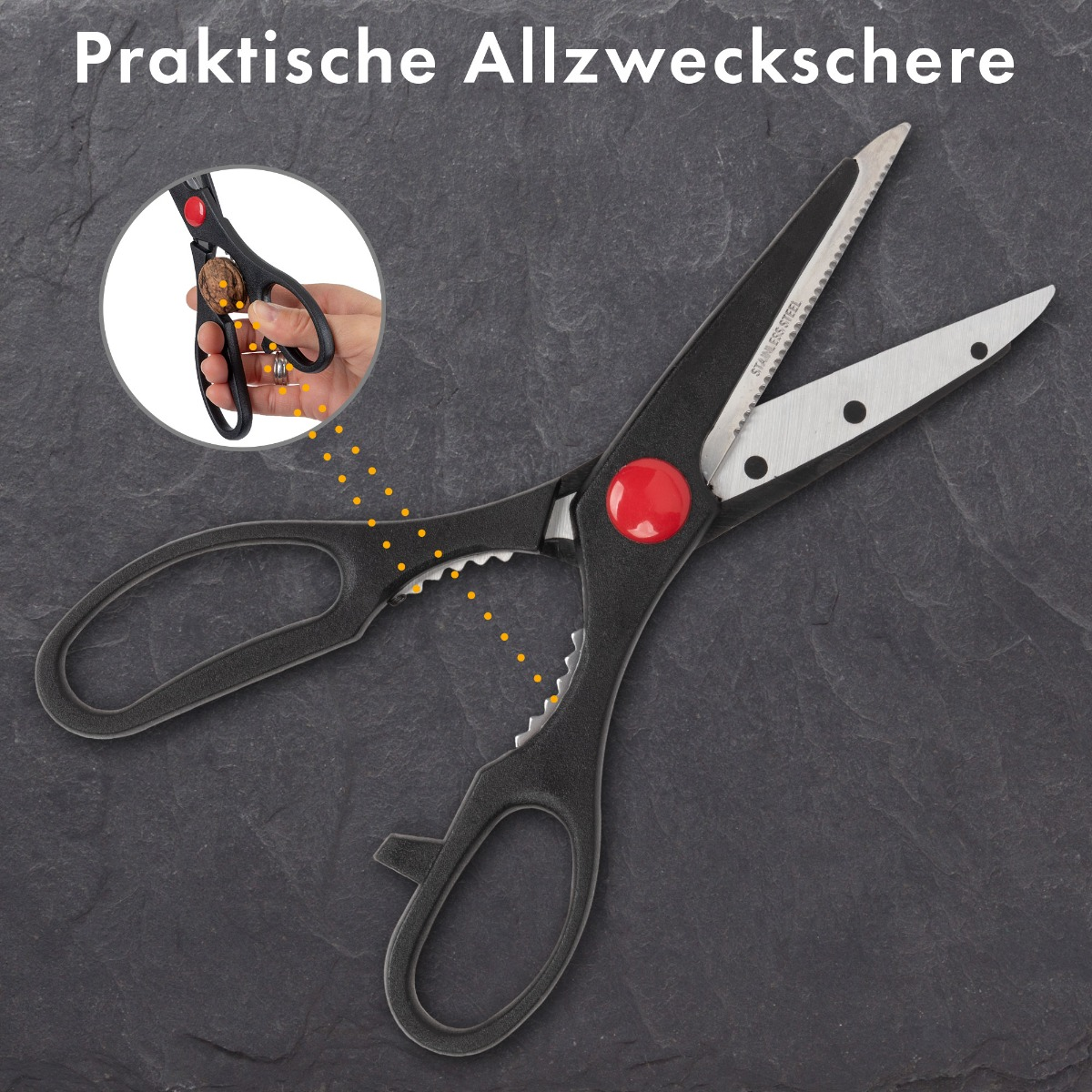 Nożyczki o wielofunkcyjnym designie, czarne i czerwone, na kamiennej powierzchni.