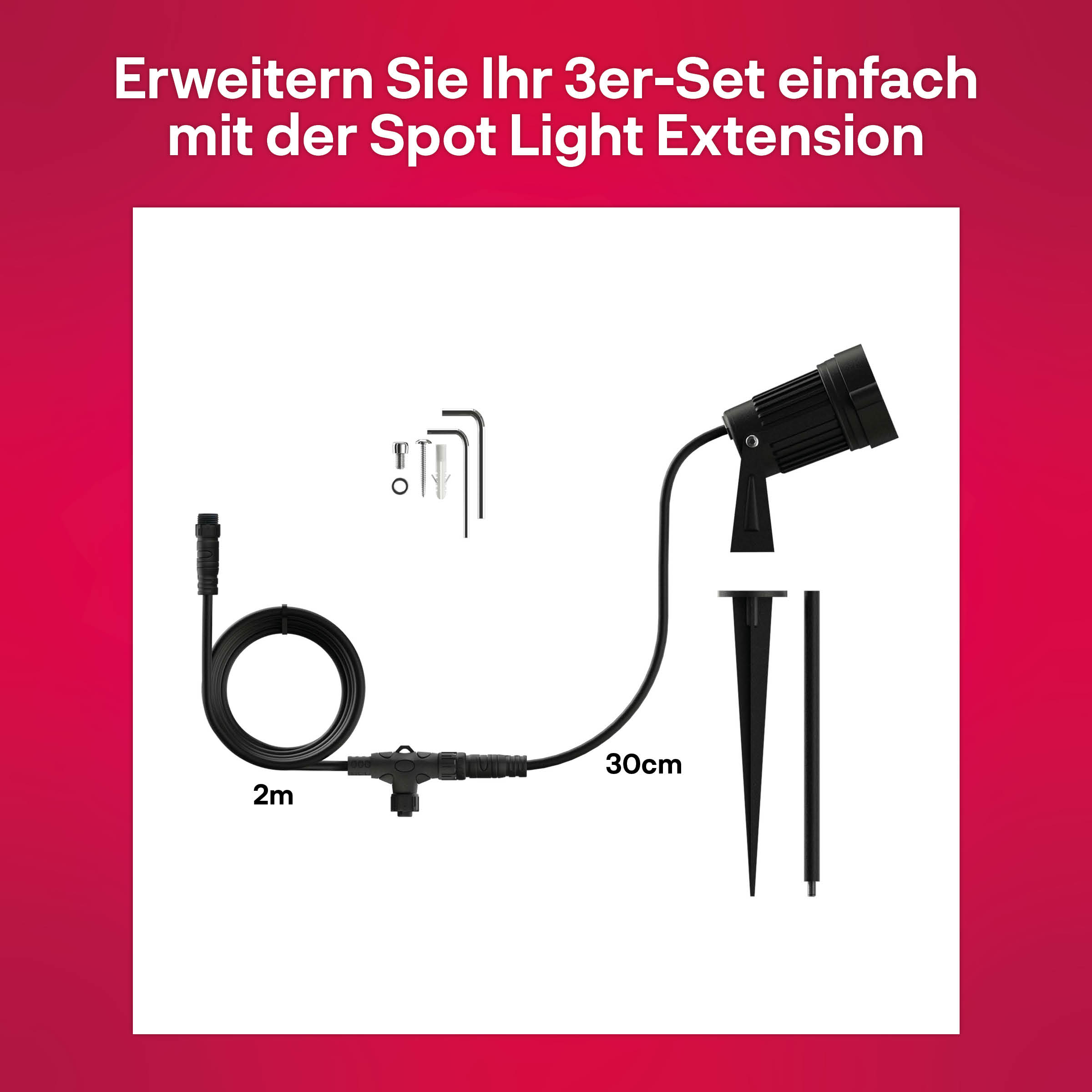 Image shows a black spotlight and extension cable with tools.