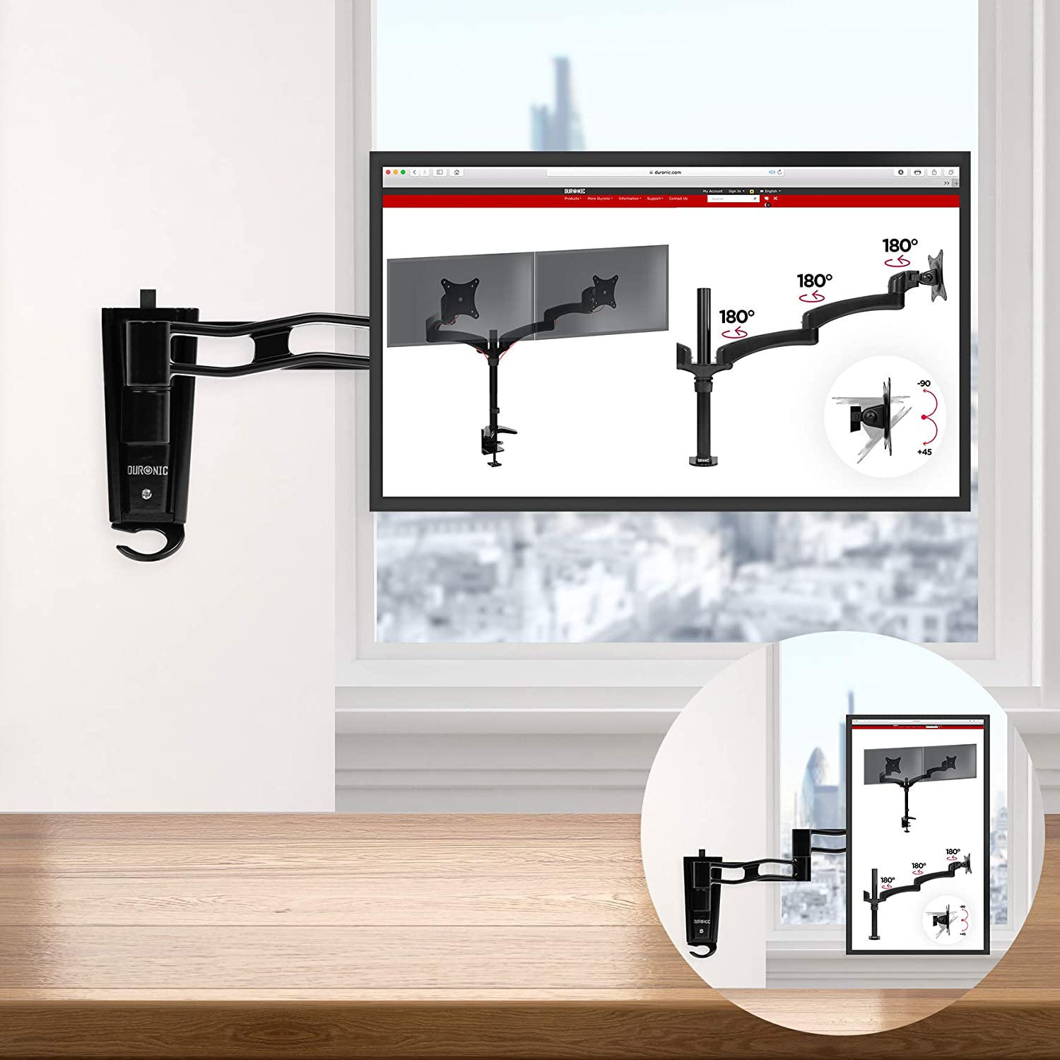 Ein Monitorarm an der Wand, mit einem Monitor, der ein Bild eines ähnlichen Aufbaus zeigt.