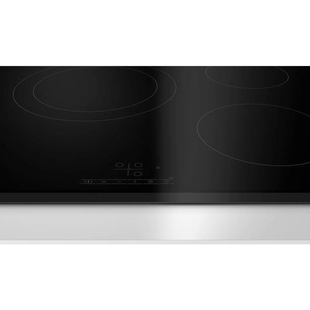 Czarna płyta grzewcza z czterema okrągłymi palnikami. Panel sterowania znajduje się pod palnikami.