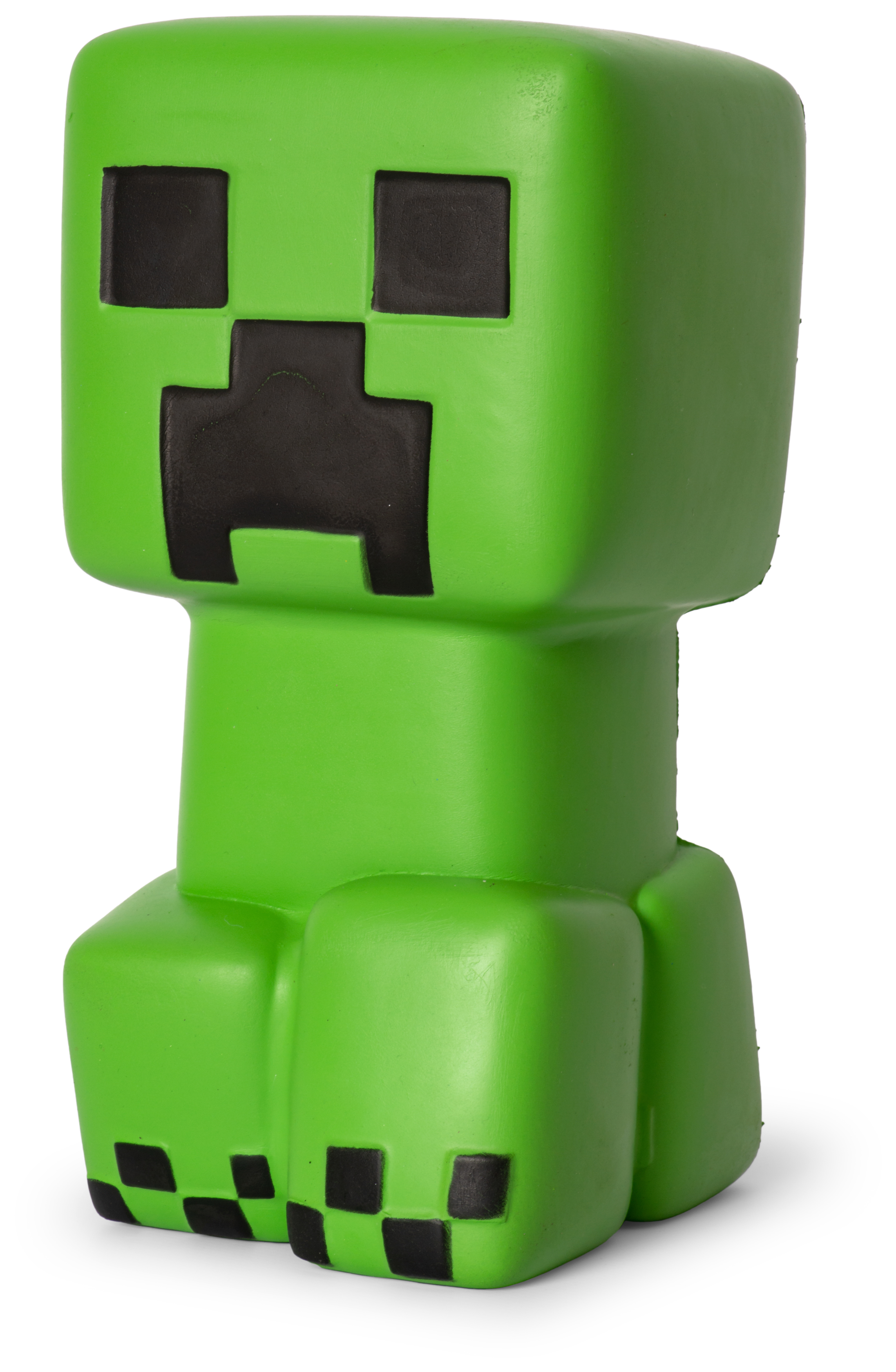 Grüne Minecraft Creeper-Figur mit schwarzen Details, die auf einer weißen Oberfläche steht.