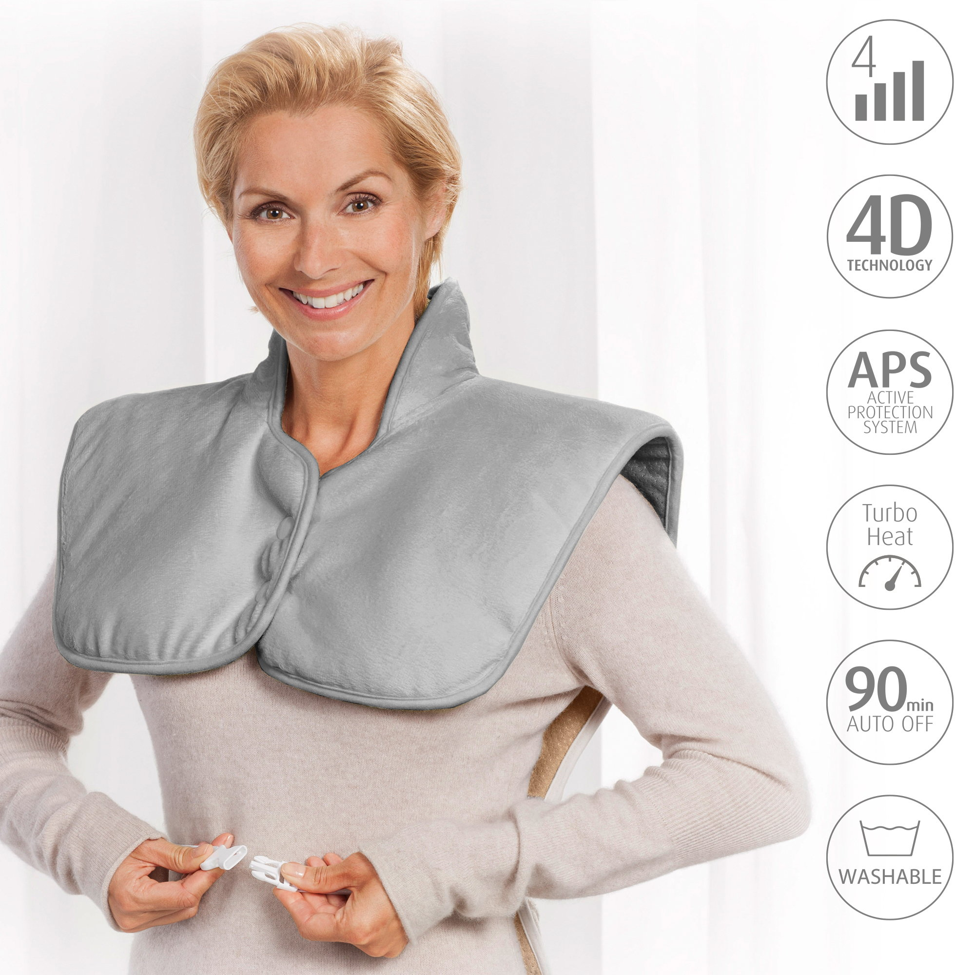 Kobieta nosząca szarą podkładkę grzewczą. Ikony wskazują funkcje. Białe tło.