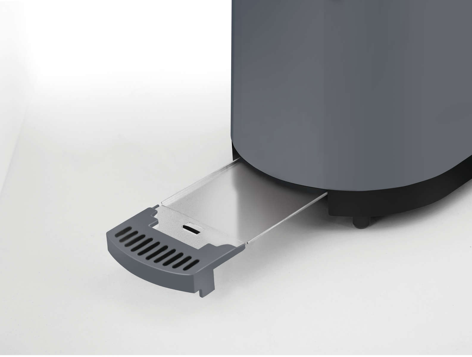 Parte di un elettrodomestico grigio con un vassoio estratto. Il vassoio ha una maniglia e fessure di ventilazione.