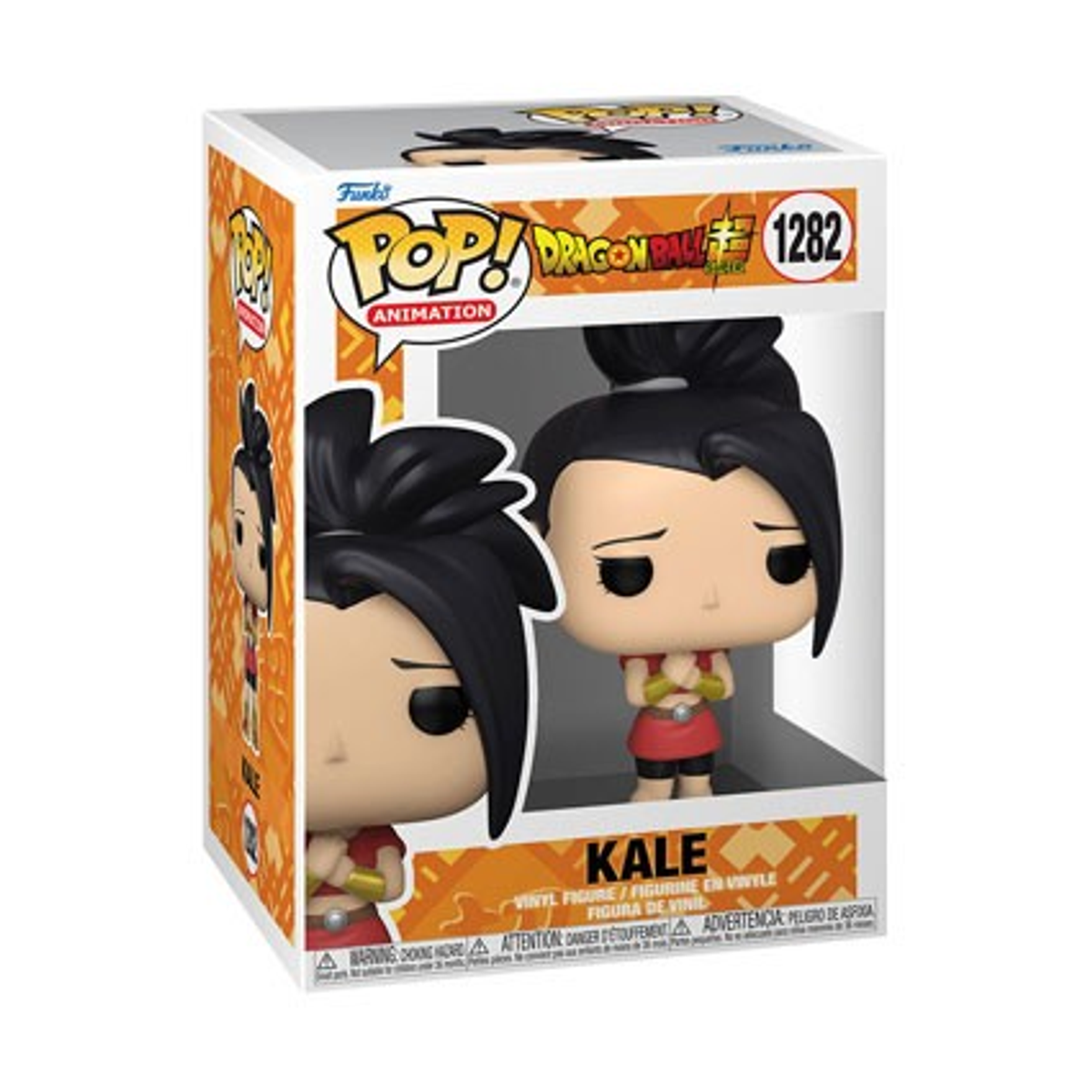 Kale-Figur in einer Box. Sie hat schwarzes Haar und trägt ein rotes Oberteil. Der Hintergrund ist weiß.