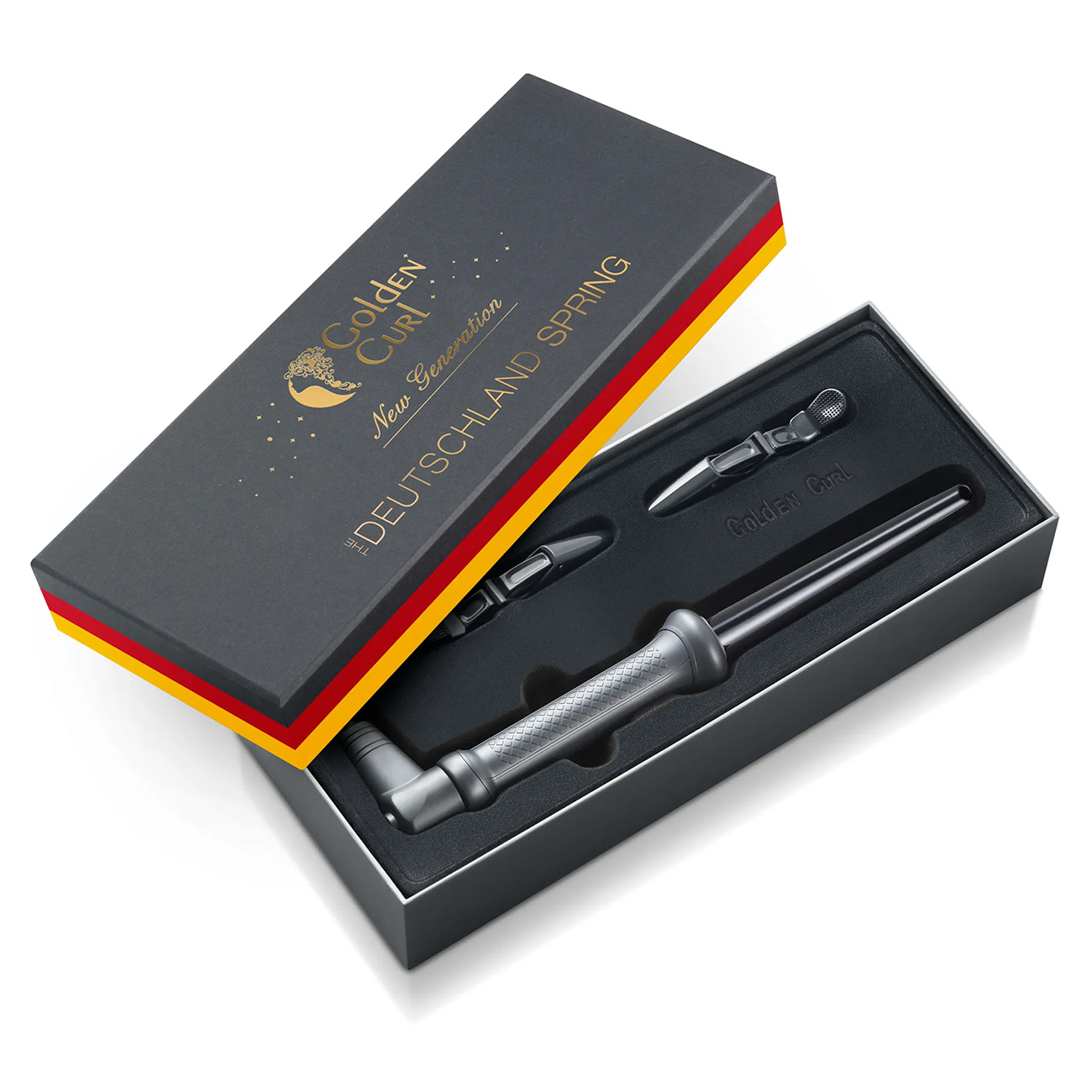 Schwarz-gelbe Box mit Haarstyling-Werkzeugen. Weißer Hintergrund.