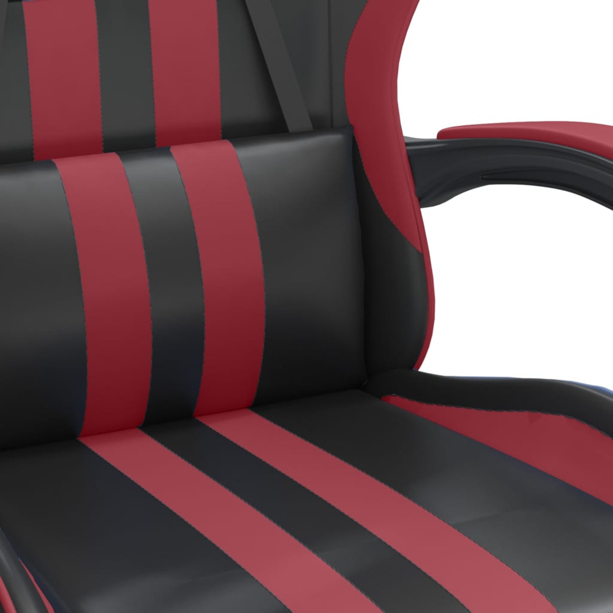Nahaufnahme eines rot-schwarzen Gaming-Stuhls, Details von Sitz und Armlehne.