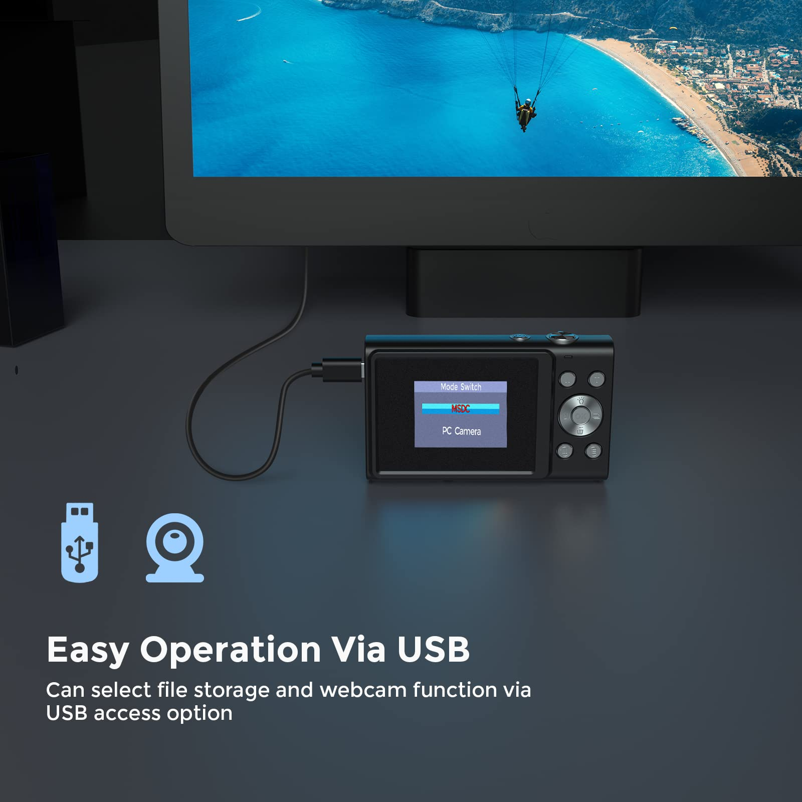 Czarny aparat cyfrowy z włączonym ekranem i ikonami USB.