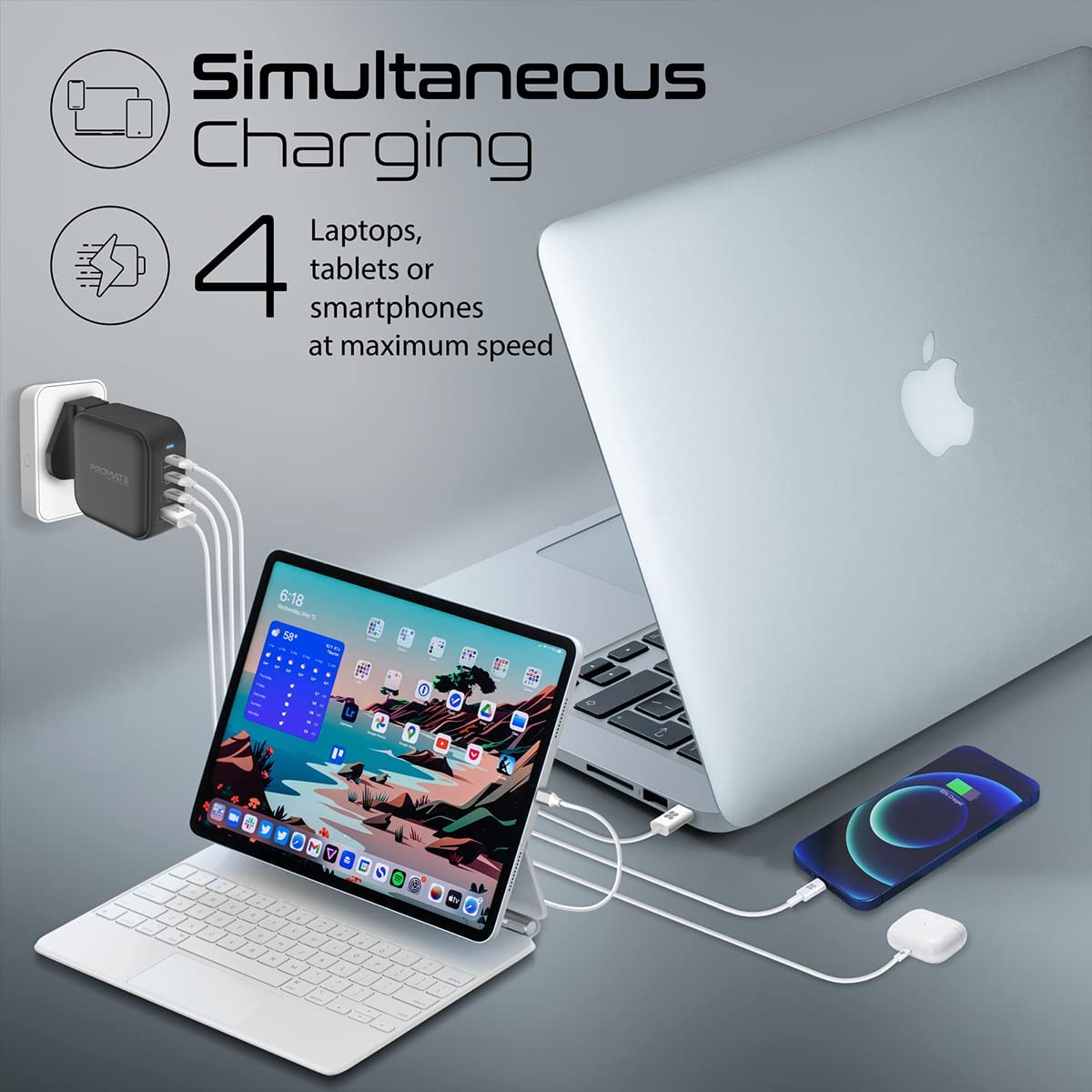 Escena que muestra varios dispositivos cargando. Una laptop, tableta y teléfono conectados a un cargador.