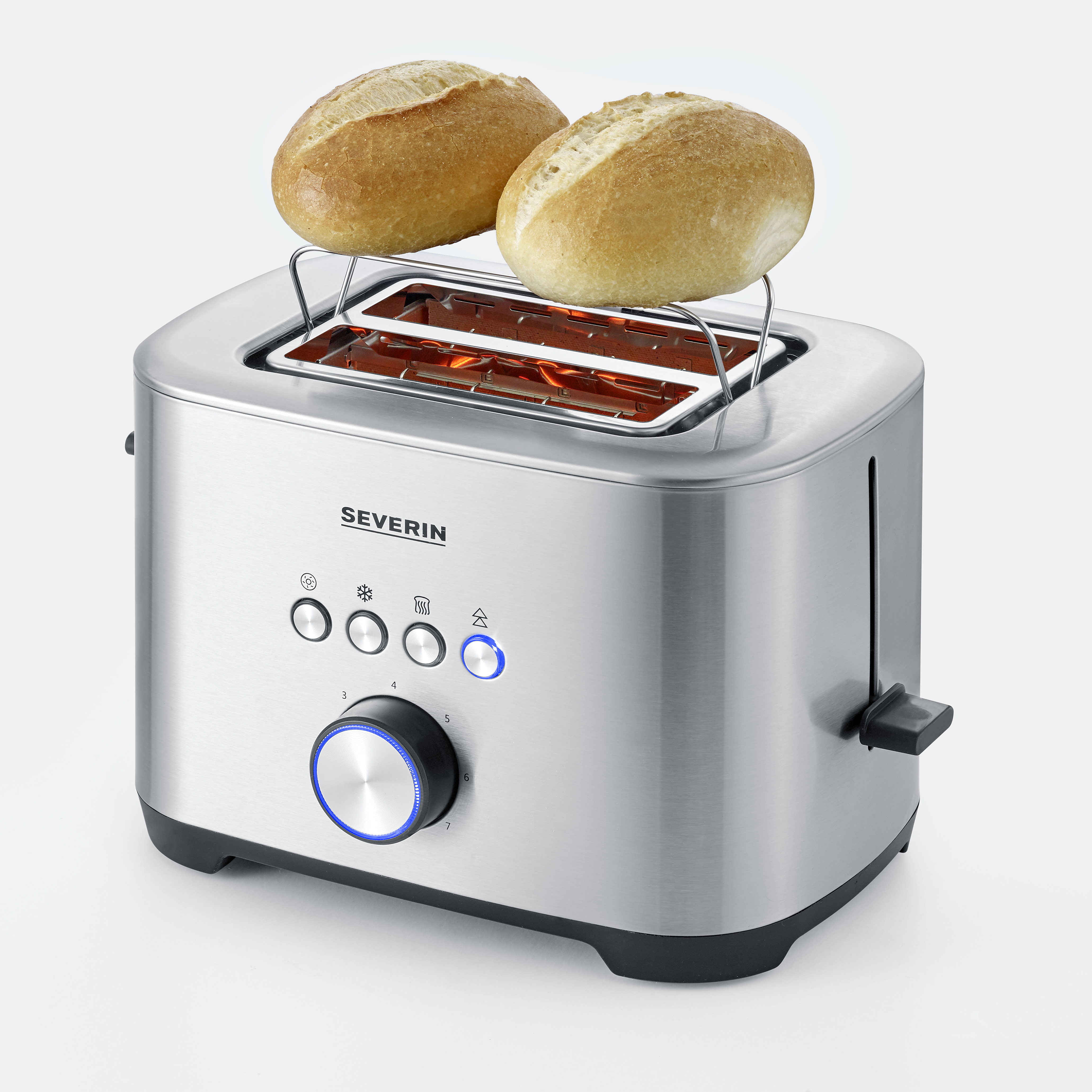 A silver toaster with two rolls of bread in the toasting slots, on a white background.