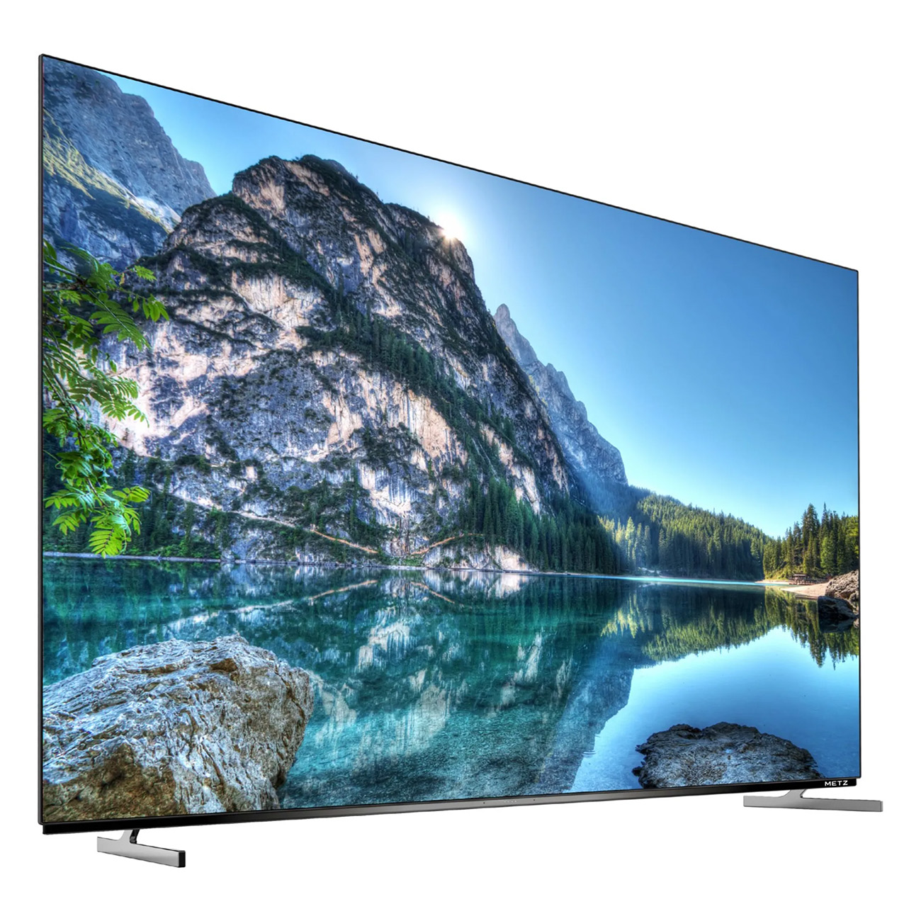 Duży telewizor z płaskim ekranem, pokazujący scenę górską i jeziorną.