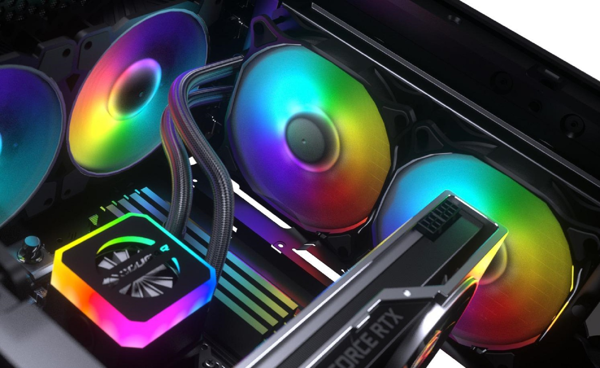 Wentylatory komputerowe z tęczowymi diodami LED. Widoczne komponenty PC.