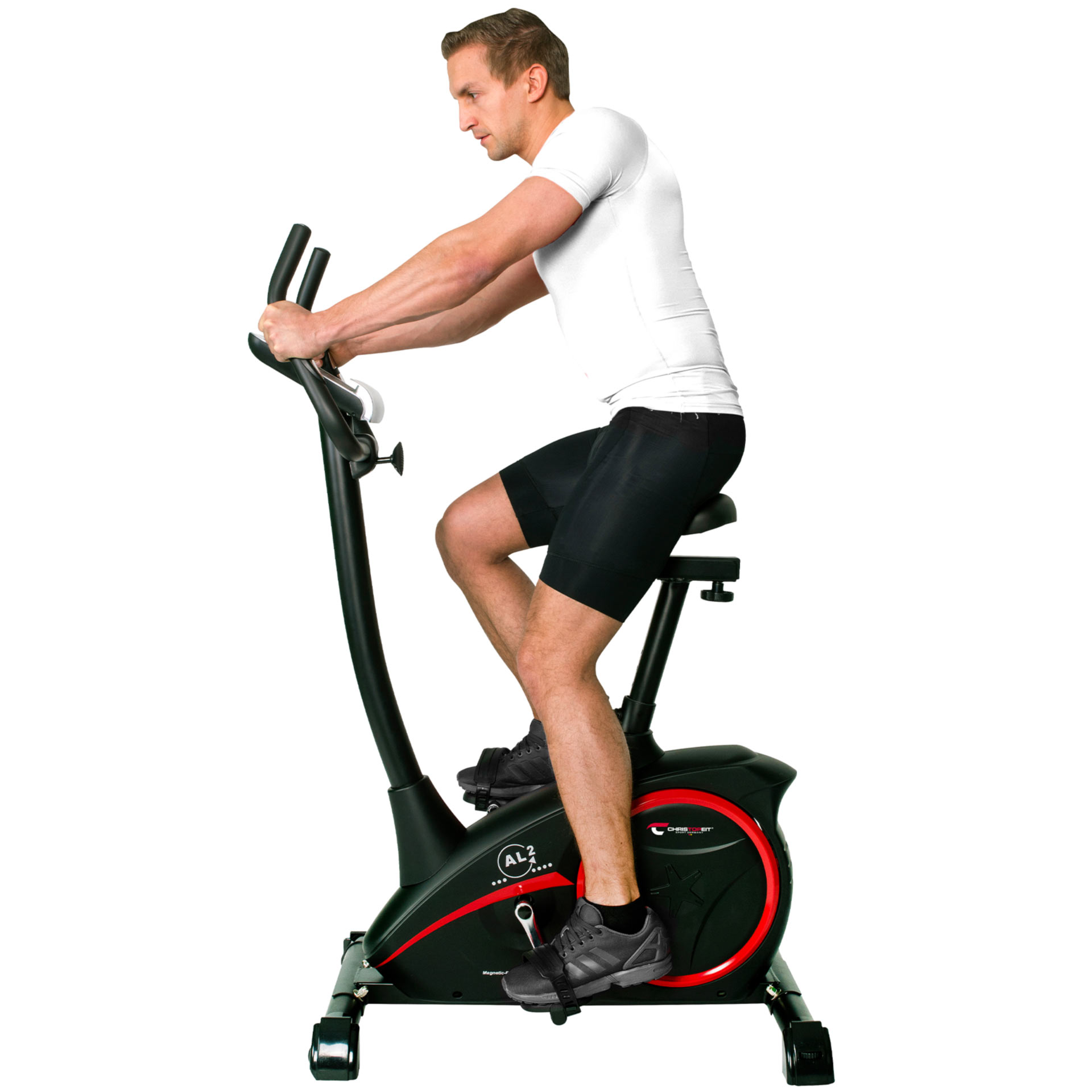 Mann, der auf einem schwarzen Heimtrainer trainiert. Er trägt ein weißes Hemd und schwarze Shorts.