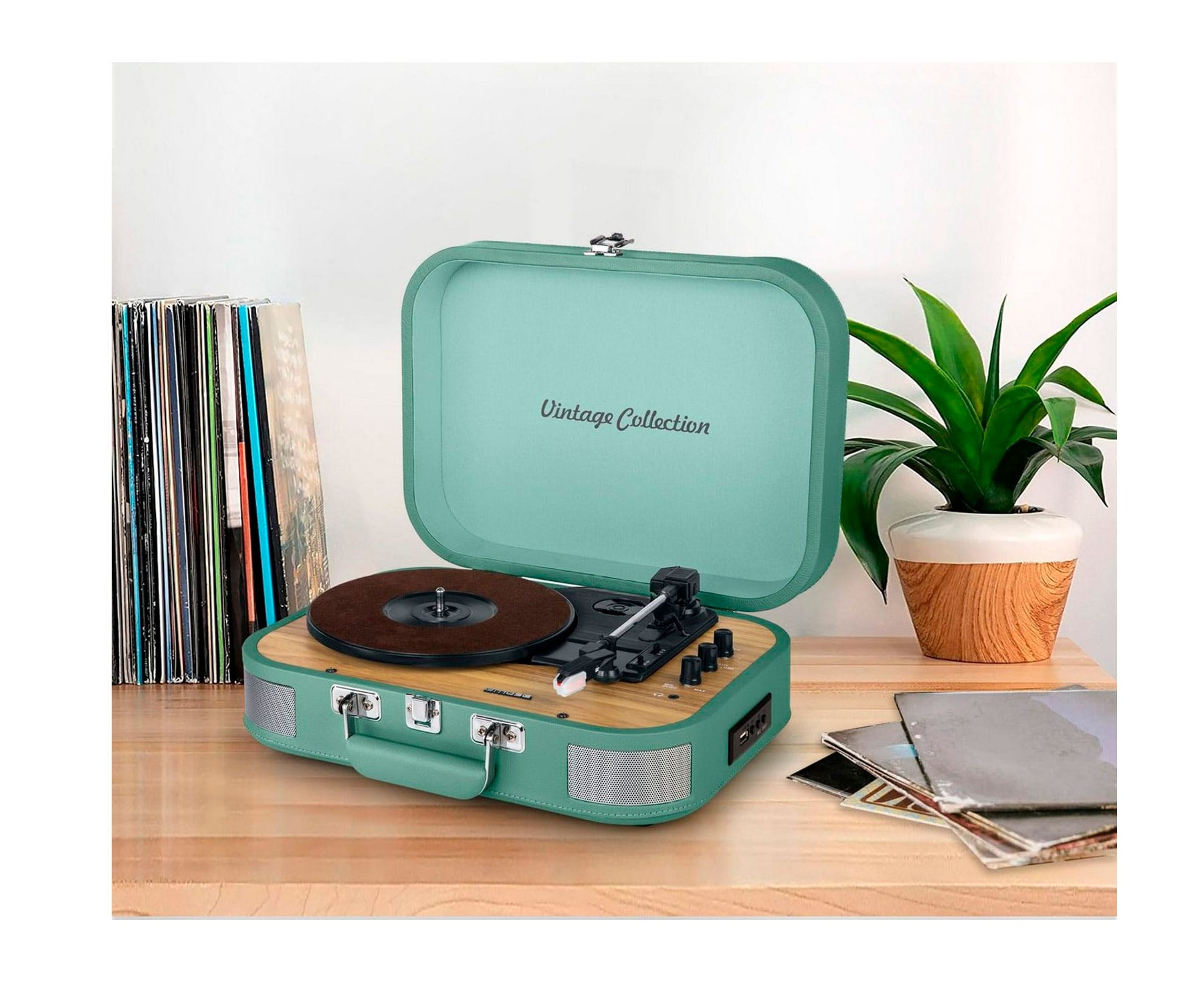 Un tocadiscos vintage. Es turquesa con base de madera.