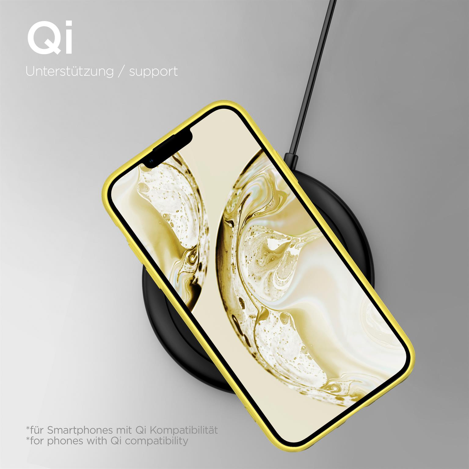 Telefon in gelbem Gehäuse, das auf einem schwarzen kabellosen Ladegerät geladen wird. Weißer Hintergrund.