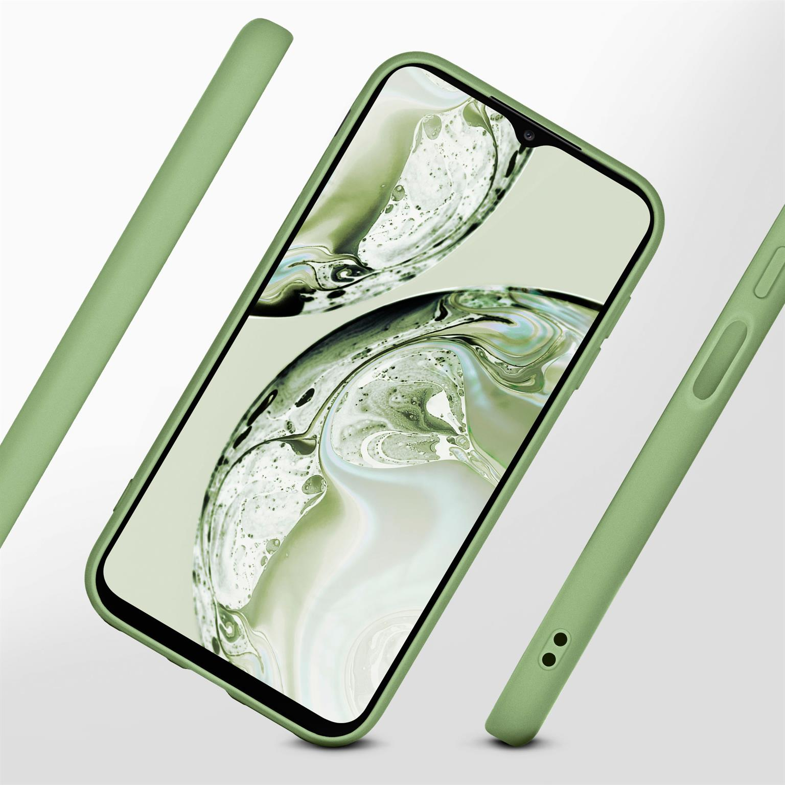 Grüne Handyhülle mit einem Telefon darin.
