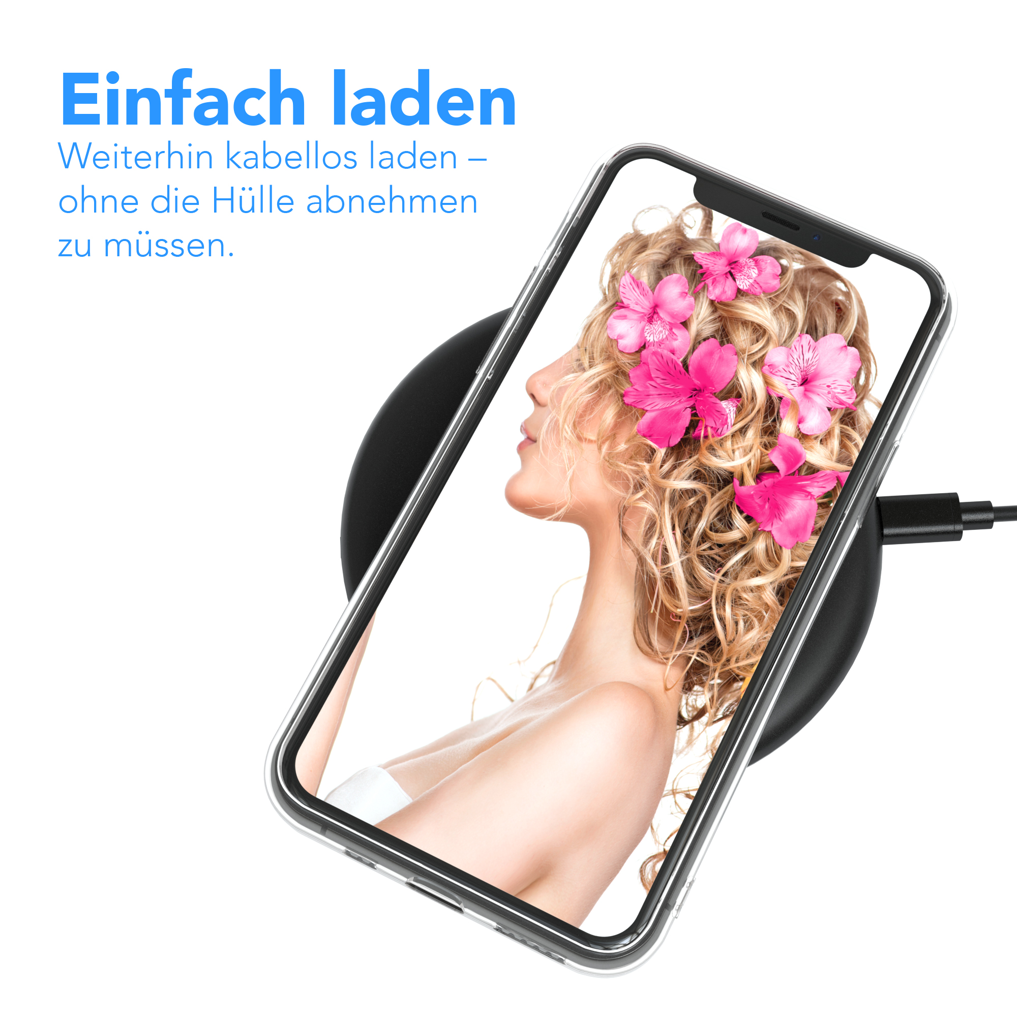 Ein Telefon auf einem kabellosen Ladegerät, das eine Frau mit Blumen zeigt.