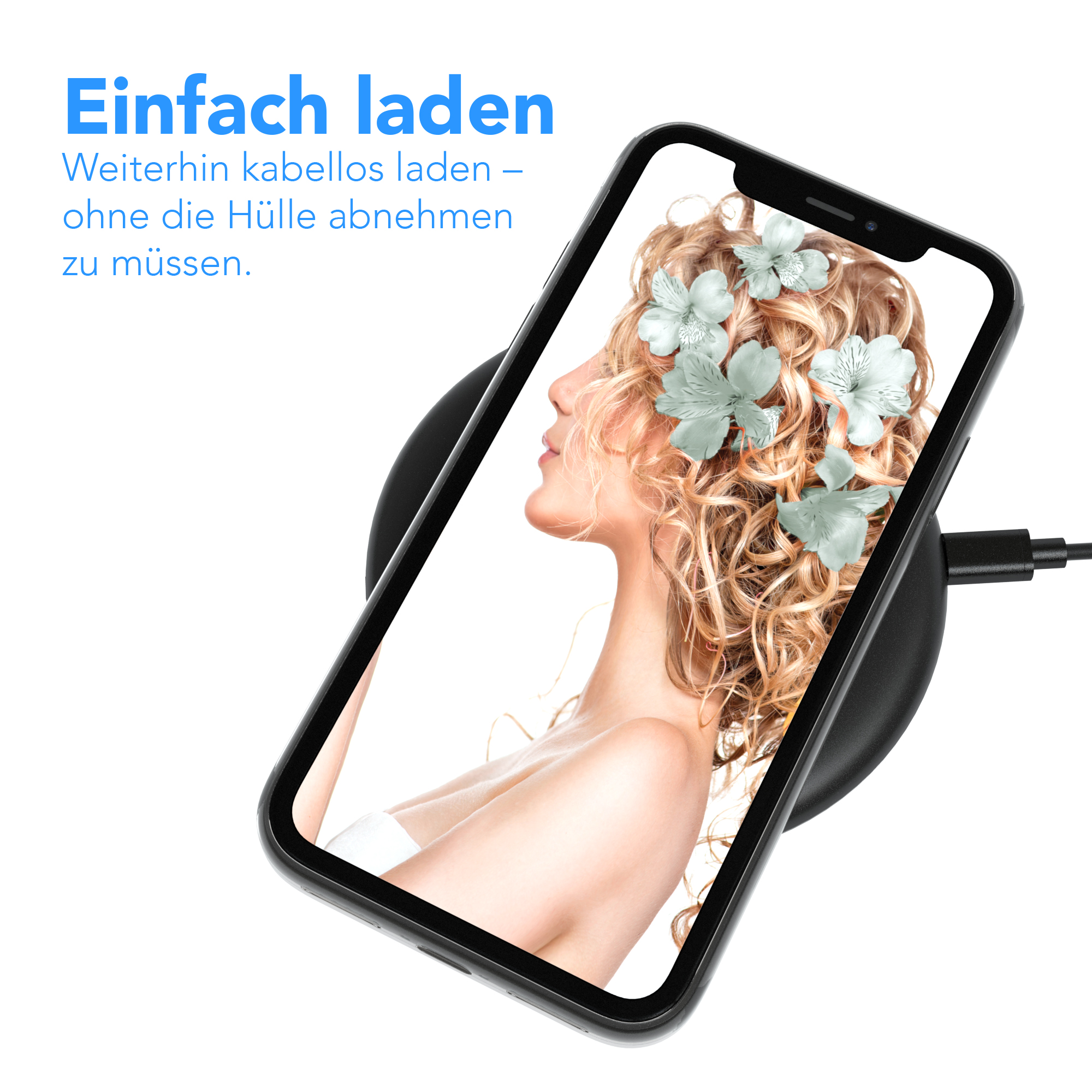 Telefon auf einem Ladepad. Gesicht einer Frau mit Blumen auf dem Bildschirm. Schwarzes Ladepad.
