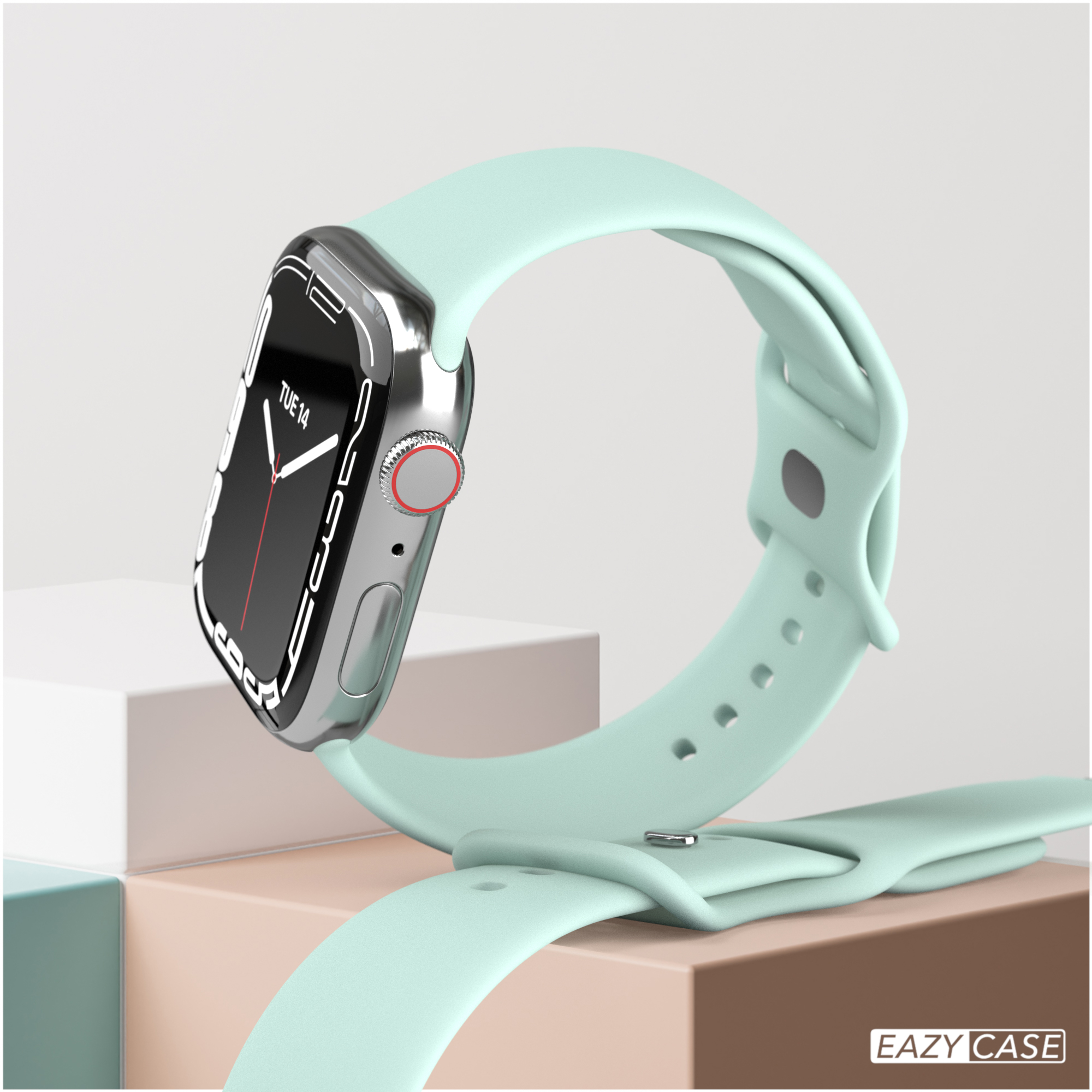 Silberne Smartwatch mit mintgrünem Armband auf neutralem Hintergrund.
