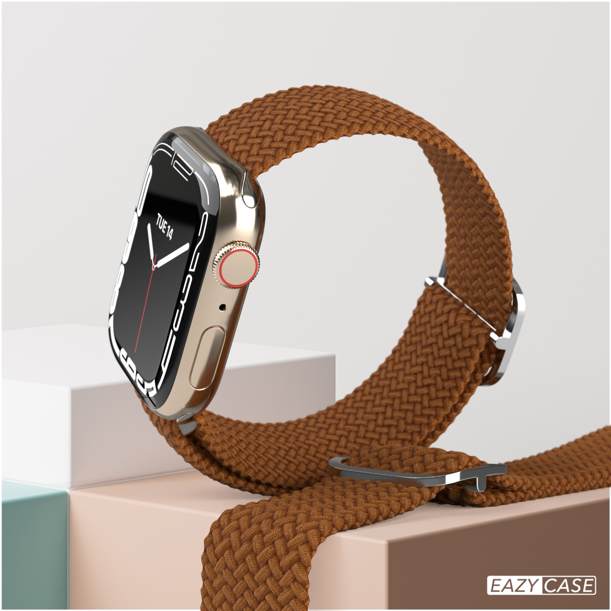 Silberne Apple Watch mit braunem gewebtem Armband. Es zeigt Dienstag, den 14. auf dem Bildschirm.