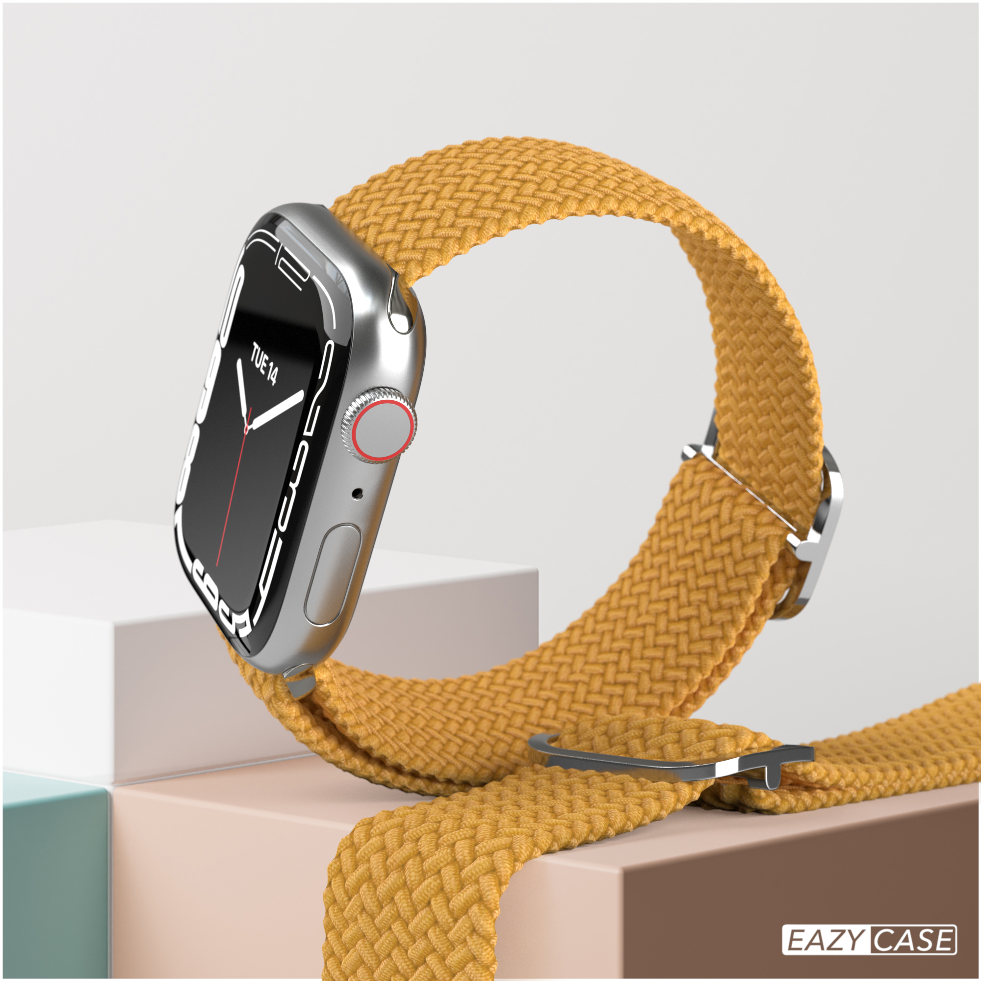 Eine silberne Apple Watch mit einem gelben gewebten Armband. Die Uhr befindet sich auf einem weißen Display.