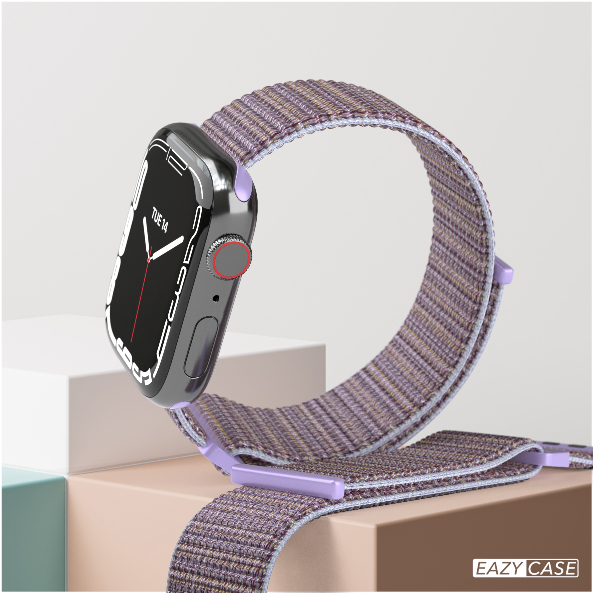 Eine Smartwatch mit lila Armband, die die Uhrzeit anzeigt, auf neutralem Hintergrund mit Requisiten.